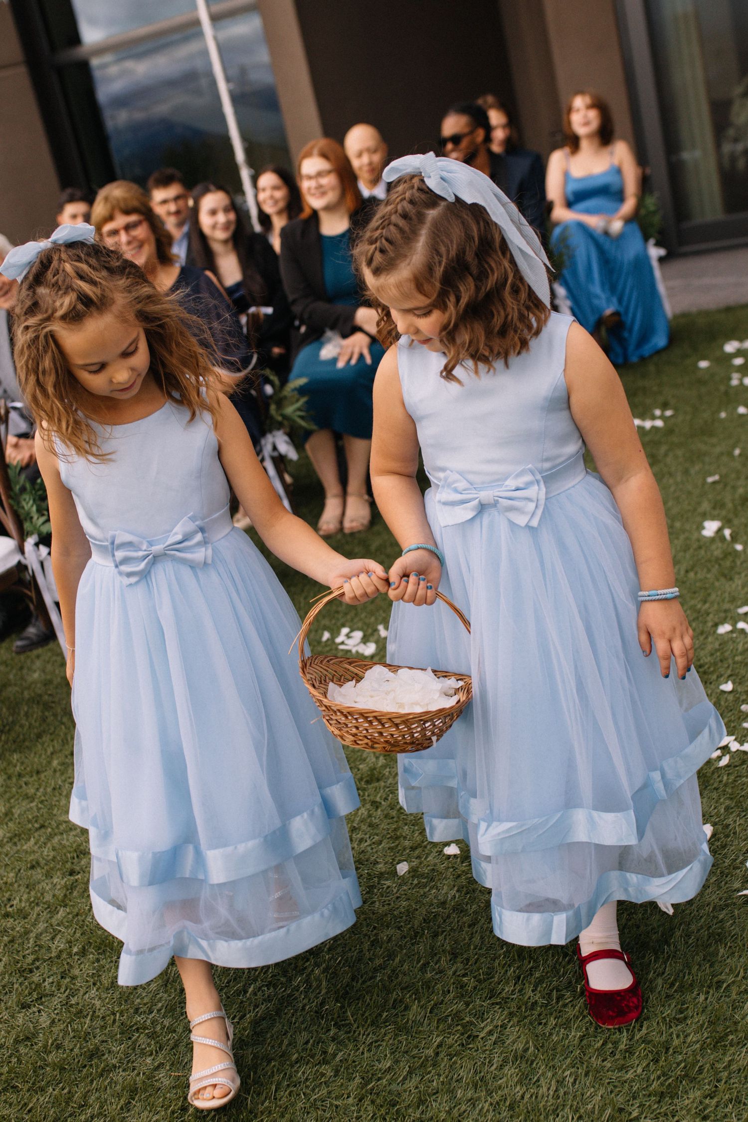 flower girls with flower petals