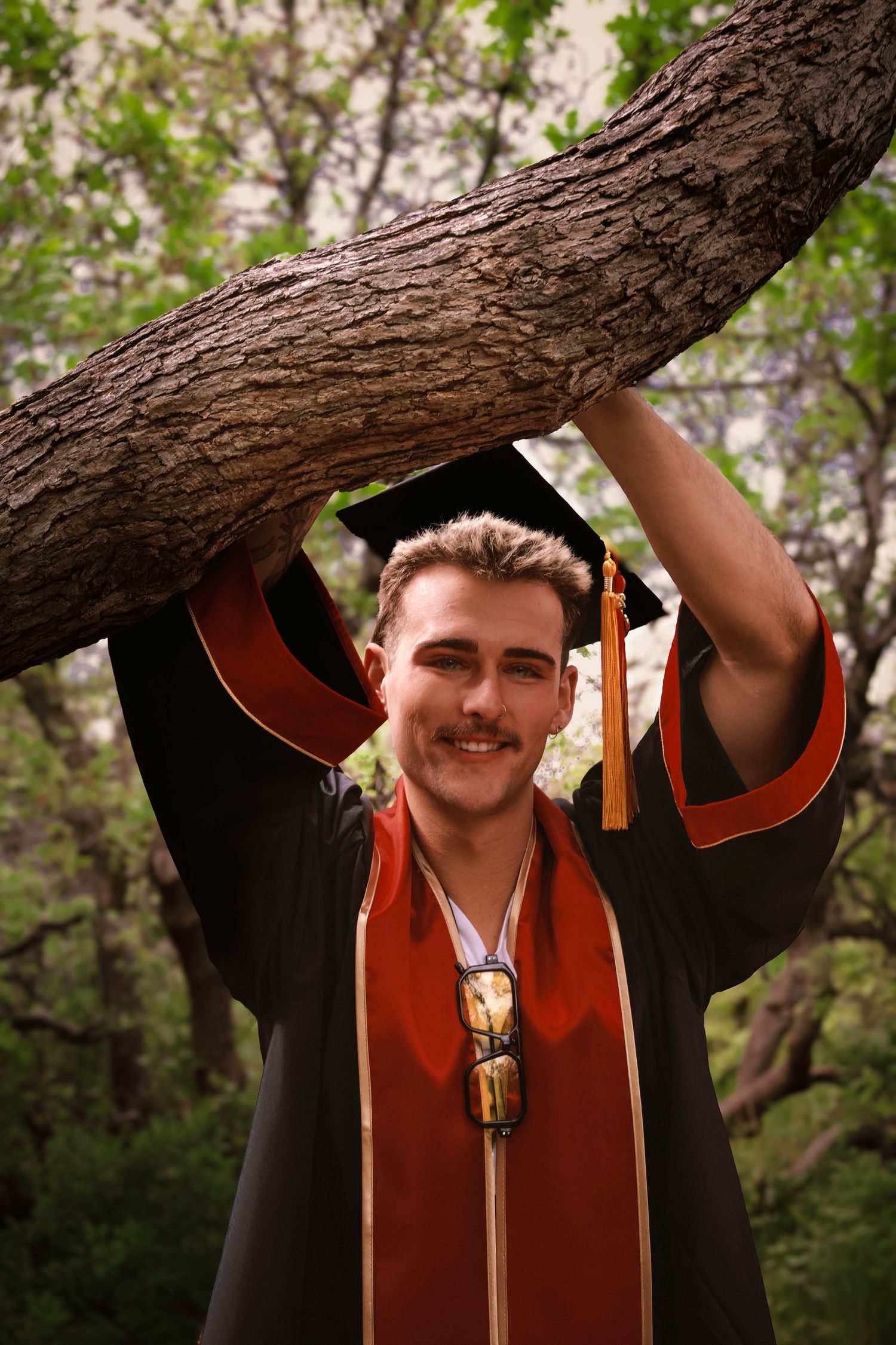 Tree portrait
Outdoor senior portrait of a male graduate posing beside a tree during a Colorado Springs graduation photography session.