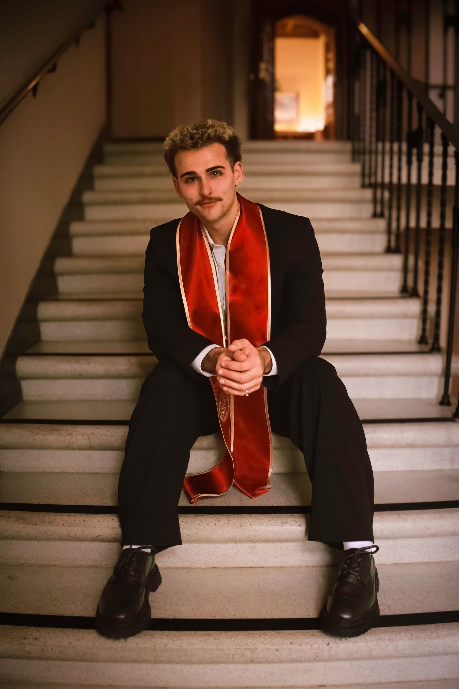 Seated graduation portrait
Colorado Springs graduation photographer portrait of a male senior sitting on outdoor steps in his graduation sto