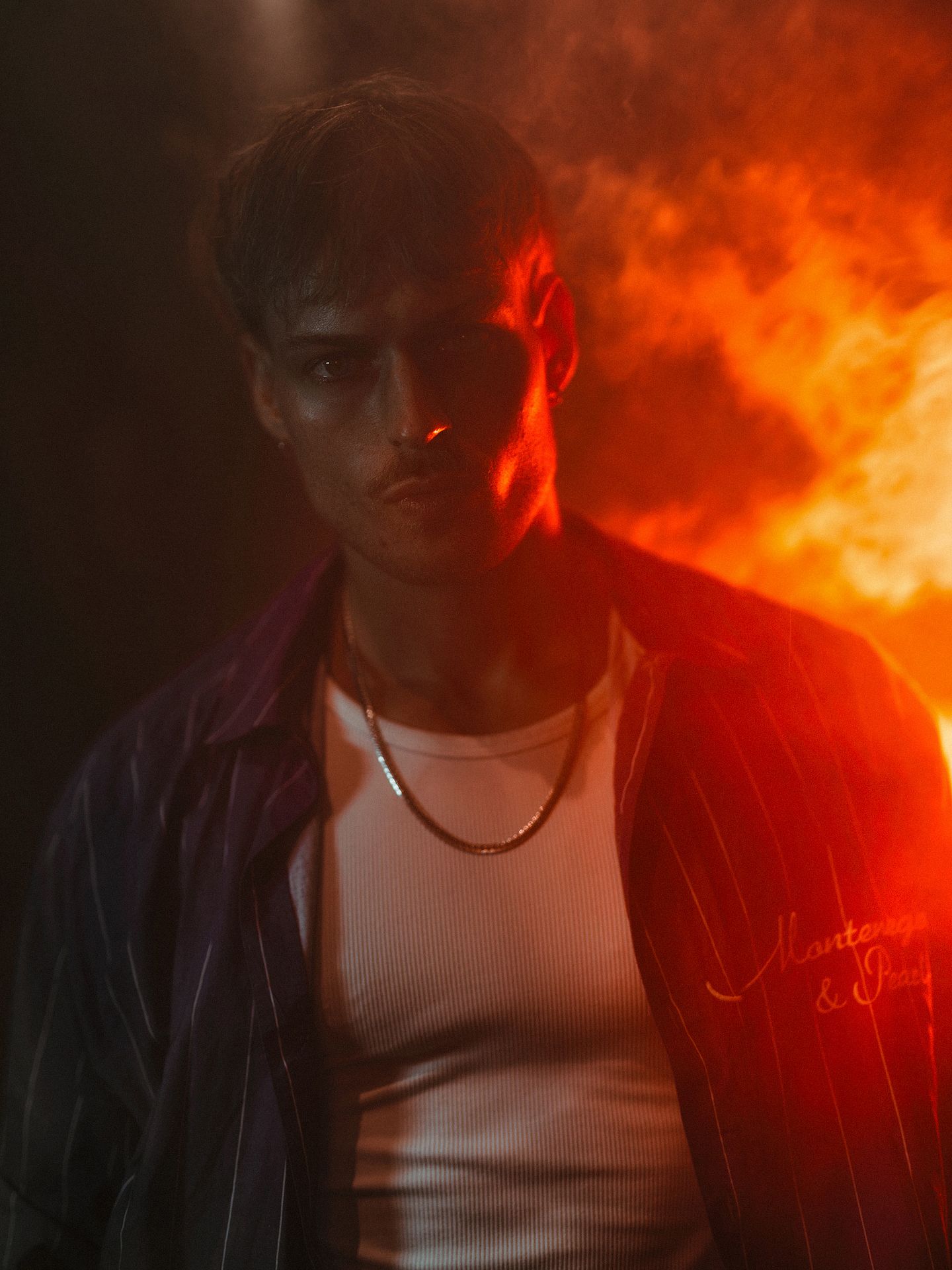 A dramatic photo sequence showing orange and red fire effects creating a moody atmospheric scene with dark shadows.