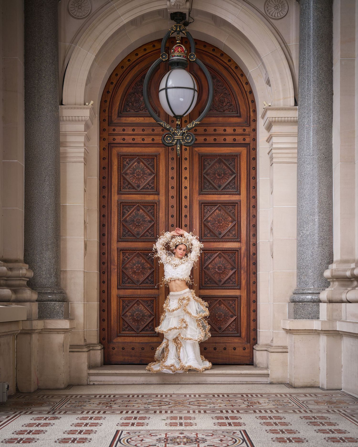 Three matching architectural photos show ornate wooden doors and stone columns in a historic building entrance.