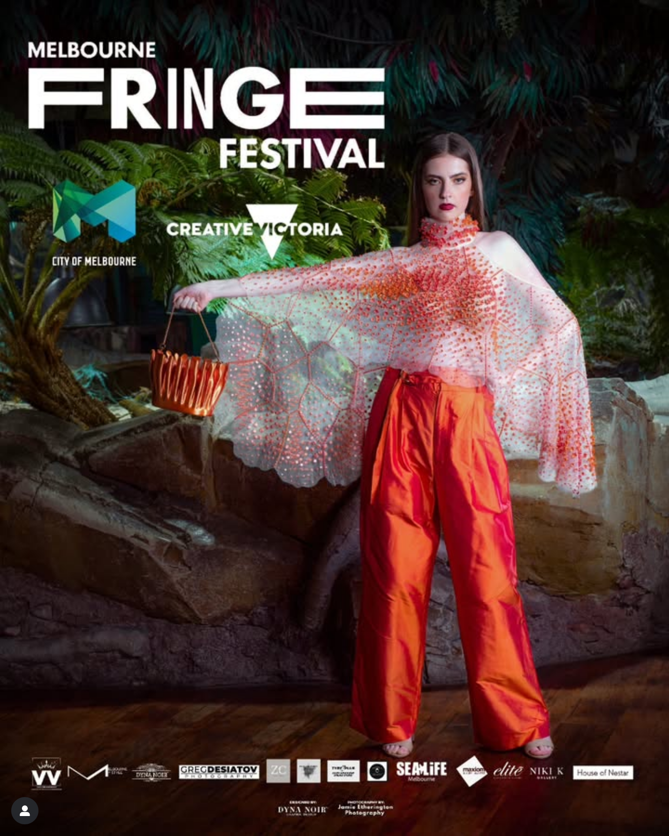 Promotional poster for Melbourne Fringe Festival featuring ethereal styling with sheer fabric and bright orange pants.
