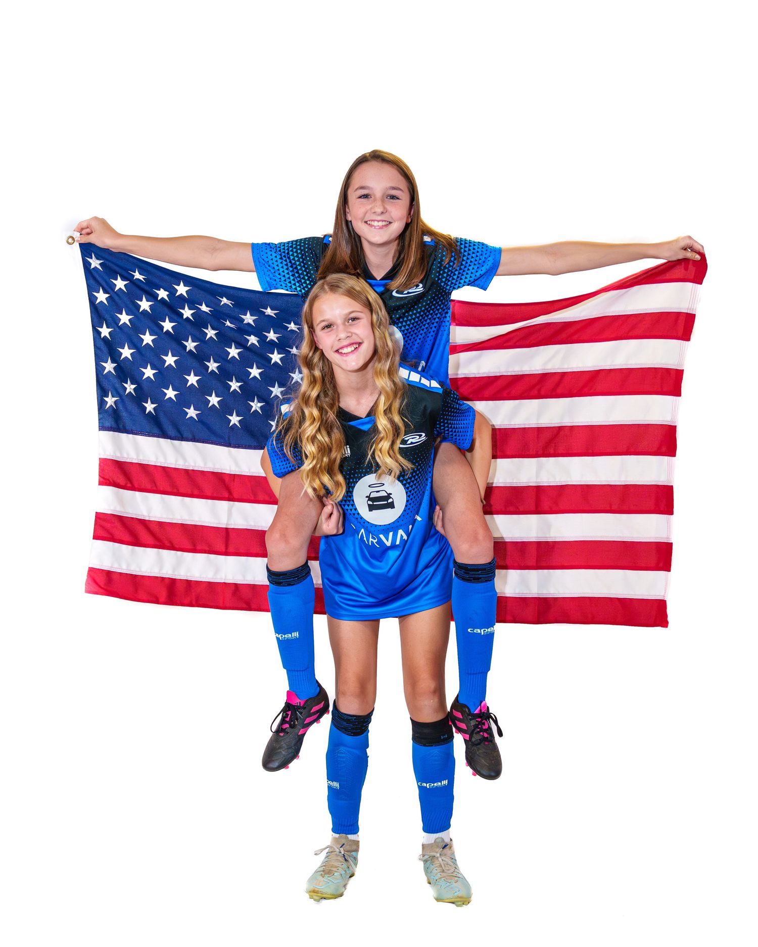 Athlete in blue uniform poses with American flag in four different celebratory positions.