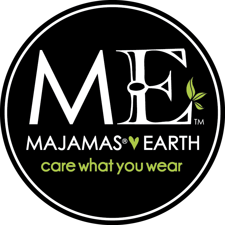 Majamas Earth circular logo with bold ME initials, tagline care what you wear, on black background.