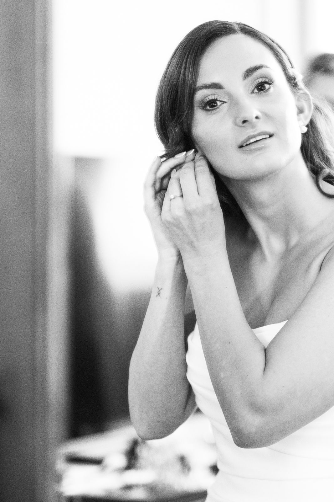 Black and white photo series showing artistic portrait poses with elegant expressions in a soft dreamy style.