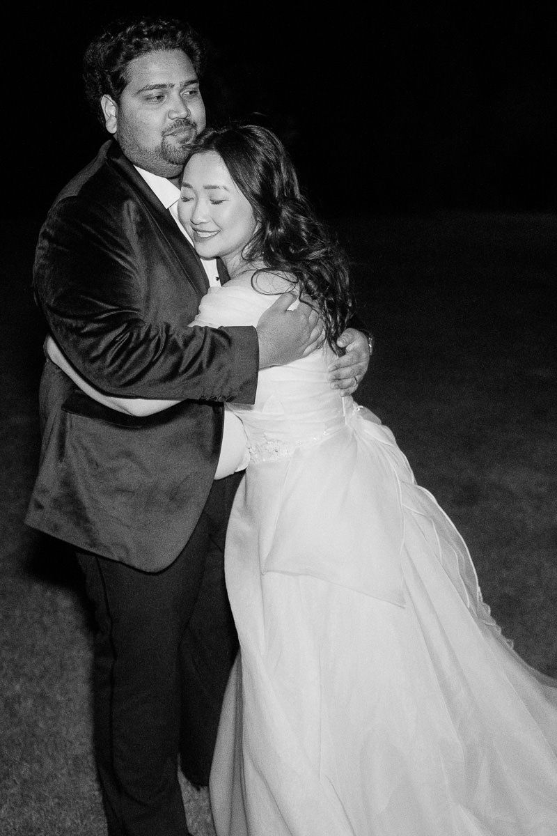 Black and white photo sequence showing a couple dancing at their wedding reception on a dark evening.