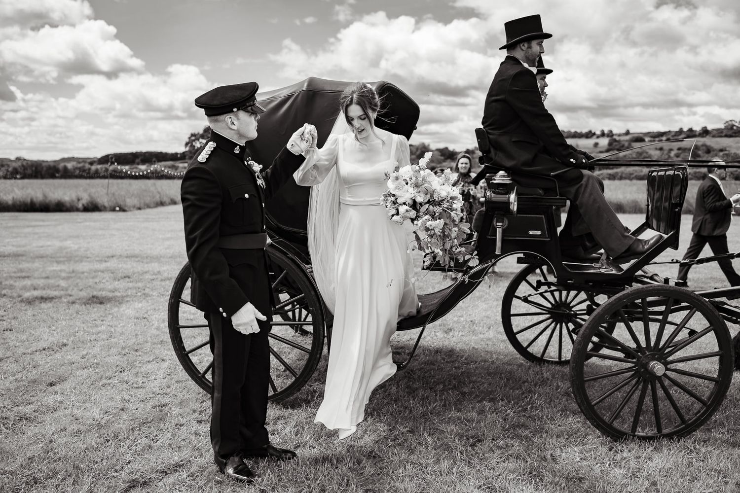 A romantic carriage ride along a scenic beach showed in multiple black and white photographs.