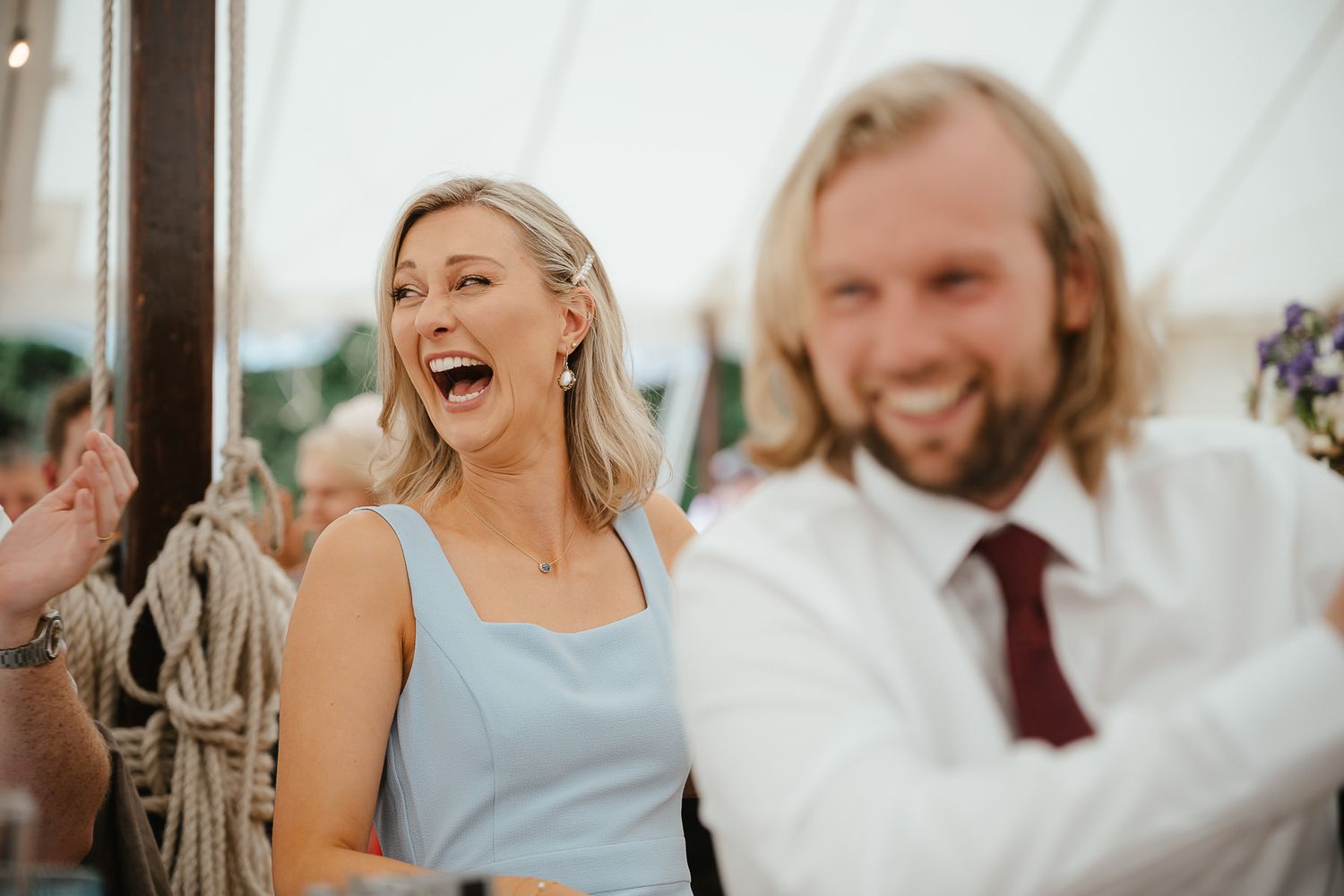 Wedding celebration scene captured in a series of candid photos showing joyful expressions and laughter in an outdoor setting.