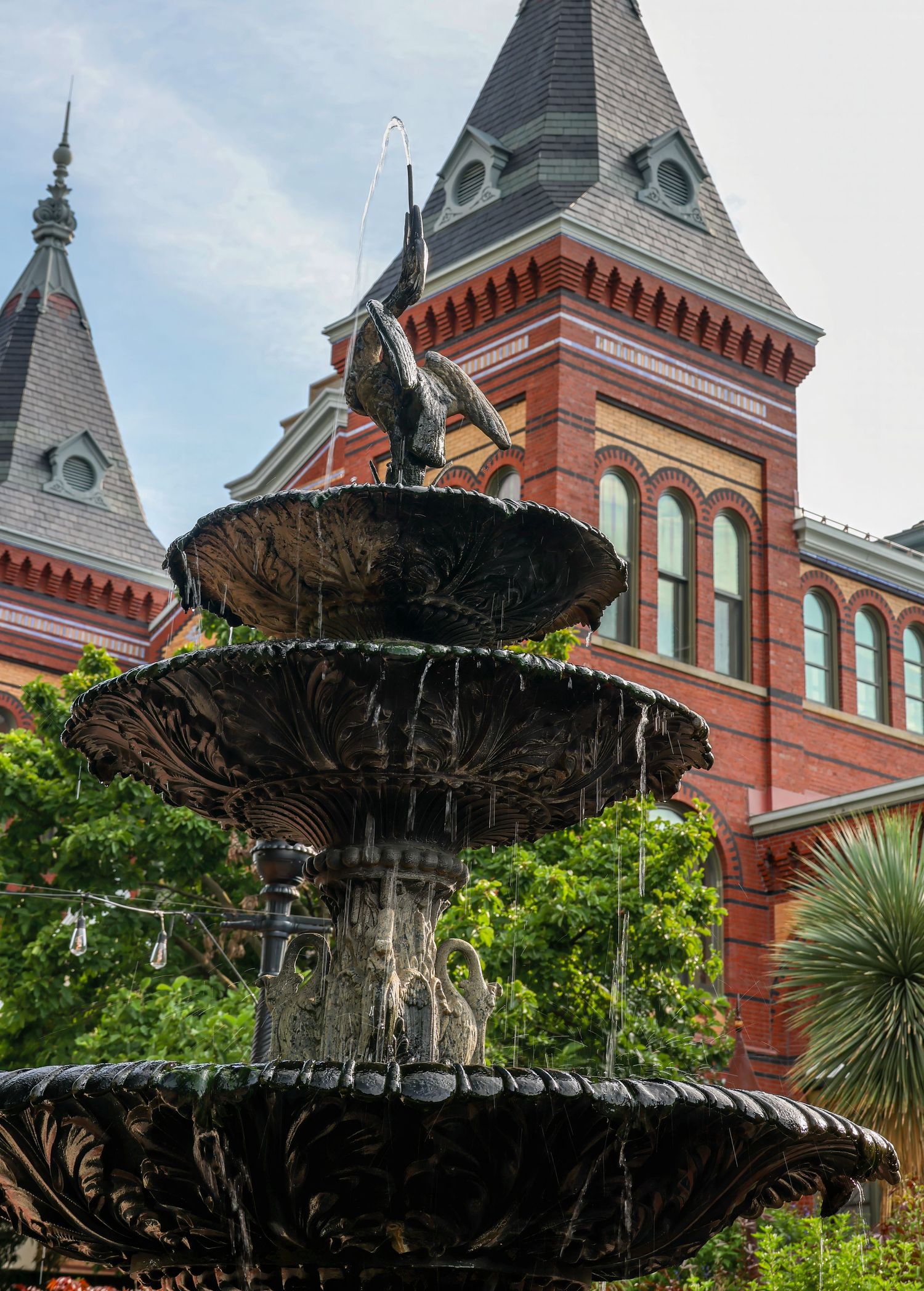 Ornate black cast iron tiered fountain near Arts and Industries Smithsonian Museum, Washington DC