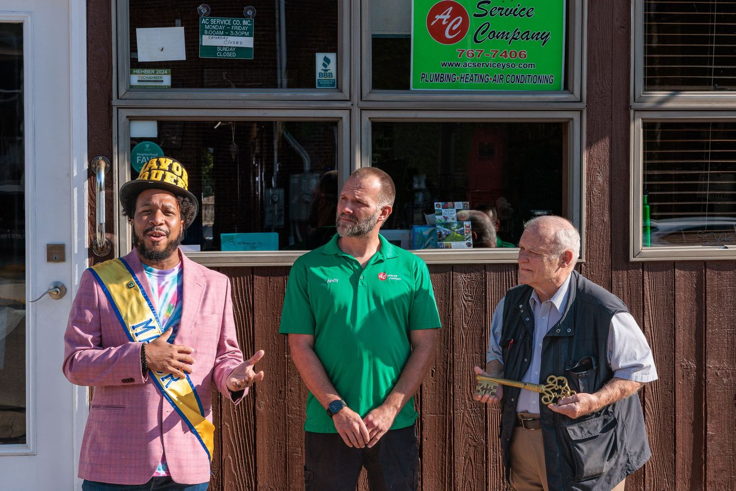 Mayor presenting at the AC Service Company key passing ceremony Yellow Springs Ohio