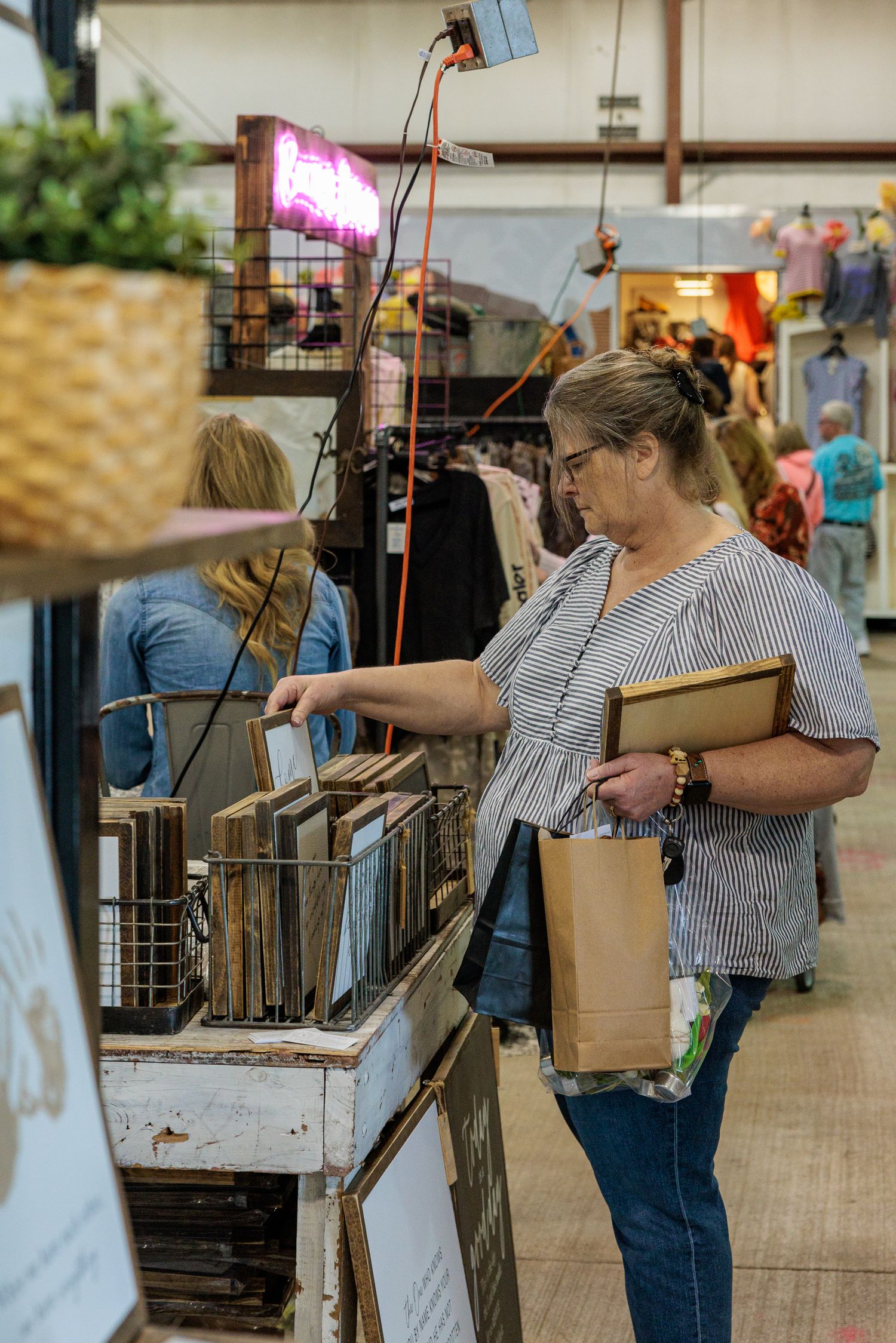 Attendee shopping for vintage goods at Vintage Market Days Greene County Ohio
