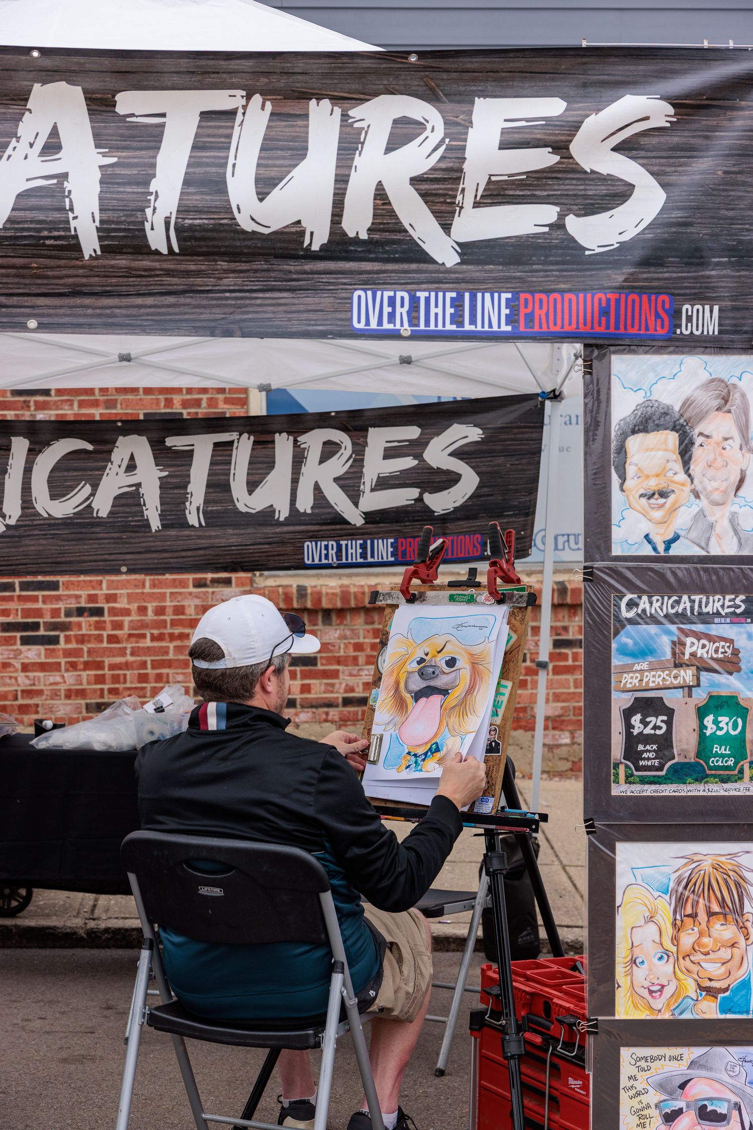 Caricature artist at work at the Sugar Maple Festival Bellbrook Ohio
