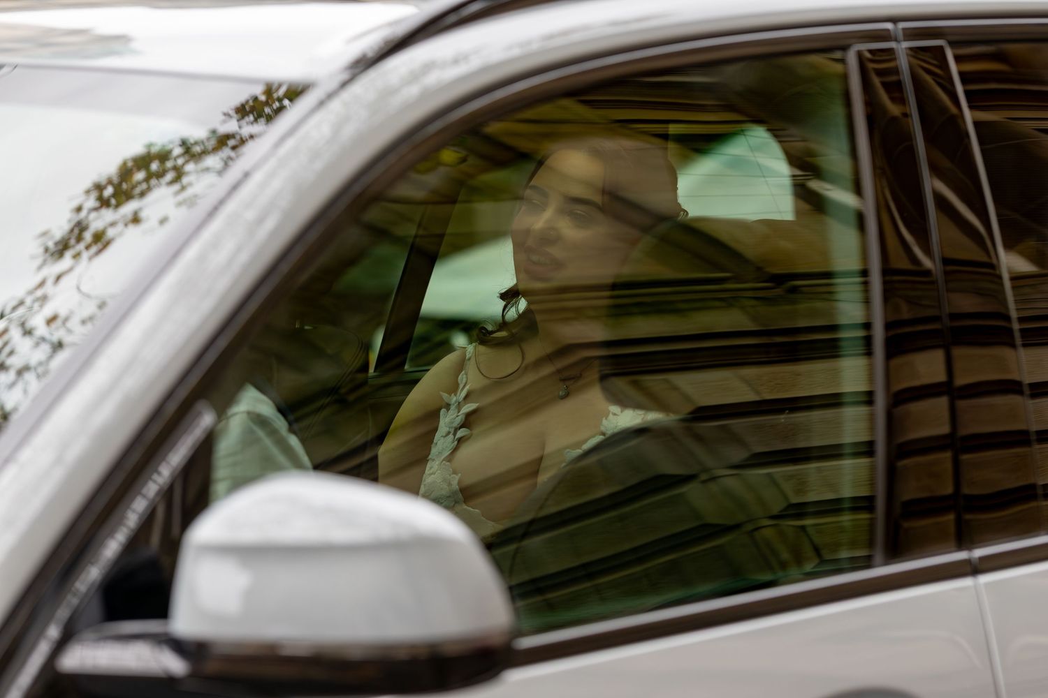 Bride in car before getting married