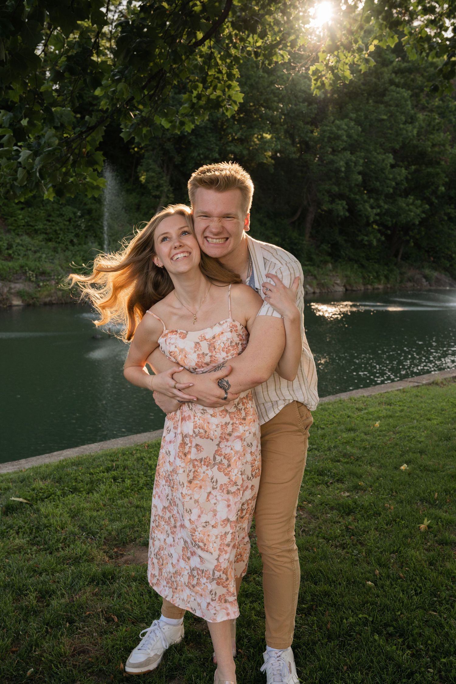 ©AnnaVonRiesenPhotography Engagement Portraits | Image of a couple holding eachother and smiling.