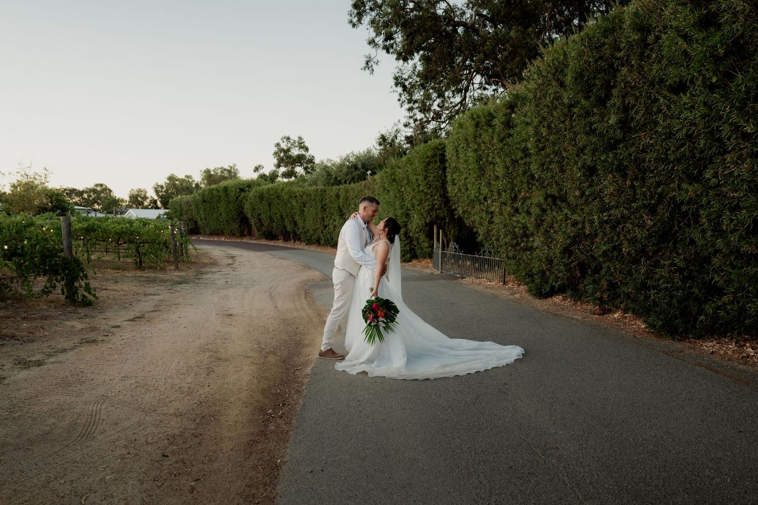 A photo of Laura and Evan on their wedding day at Chapel Farm Estate in Perth