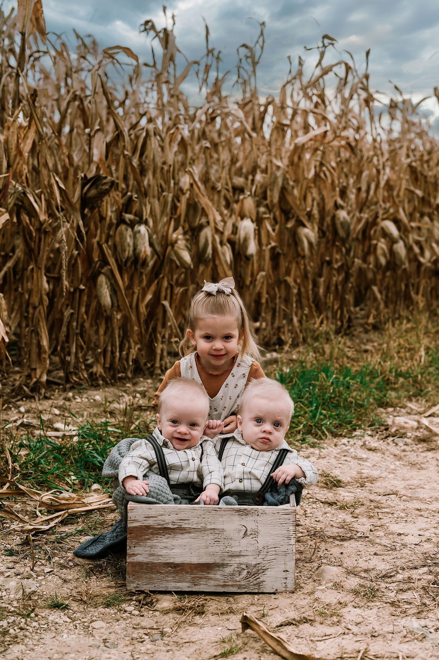Generational photoshoot in Boltonville, WI with Grandkids in corn field