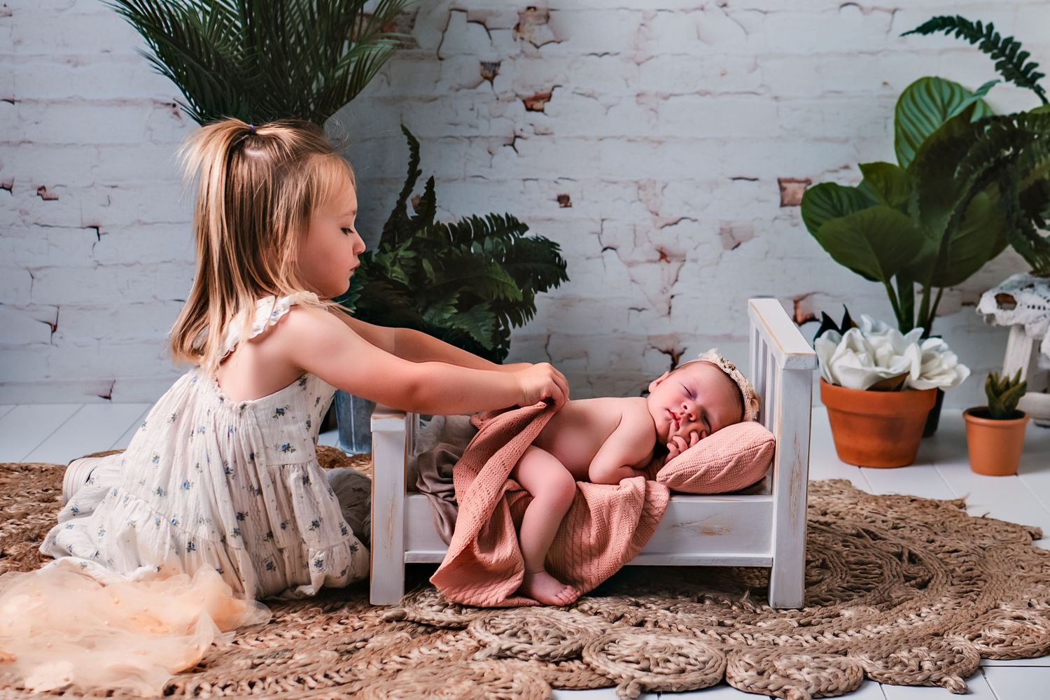 Newborn sibling session in Kewaskum, WI Studio. Newborn Baby Girl with Big Sister. Maternity and Newborn Photographer Wisconsin