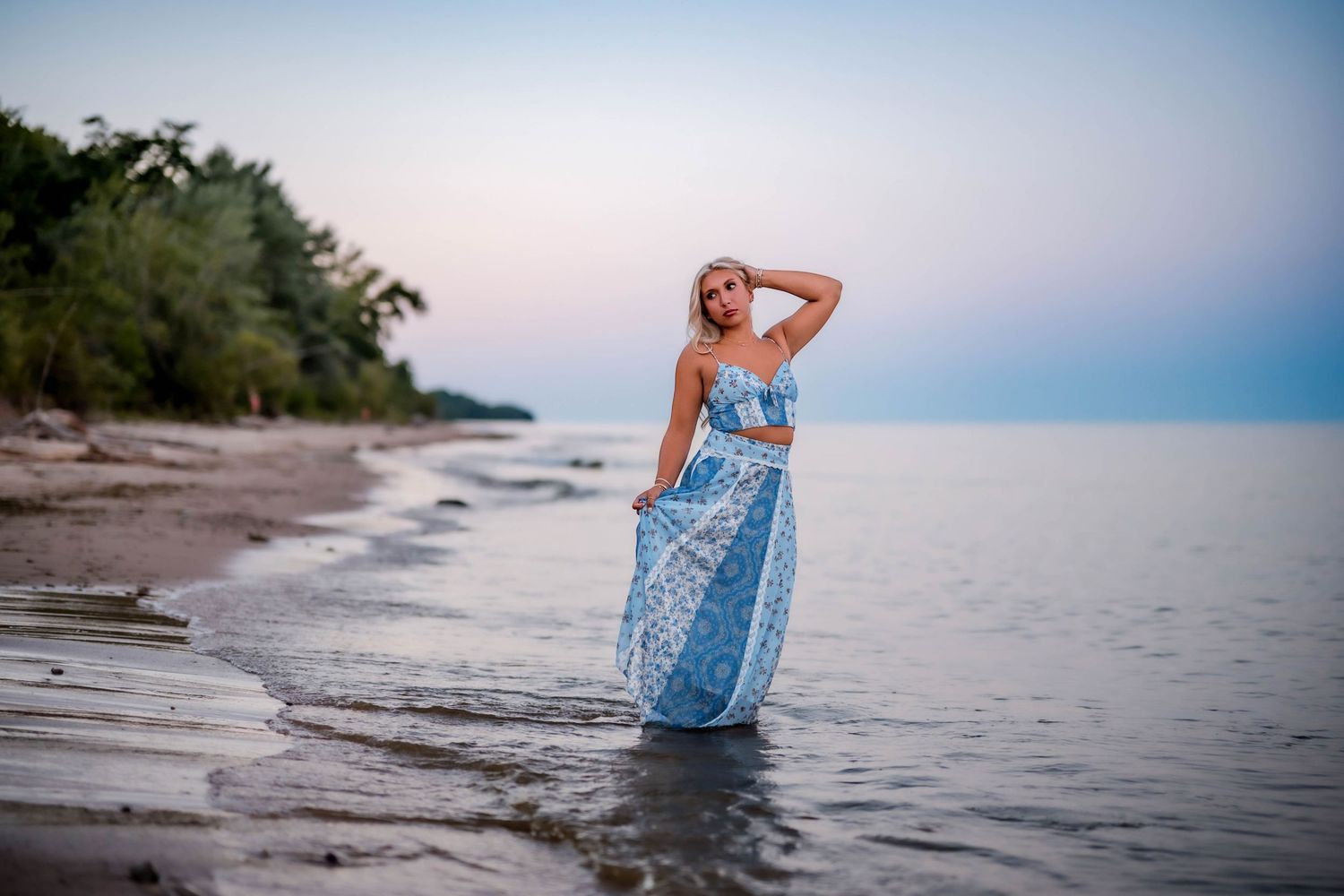 Senior girl in a dressy blue maxi dress for Lake Michigan senior photos