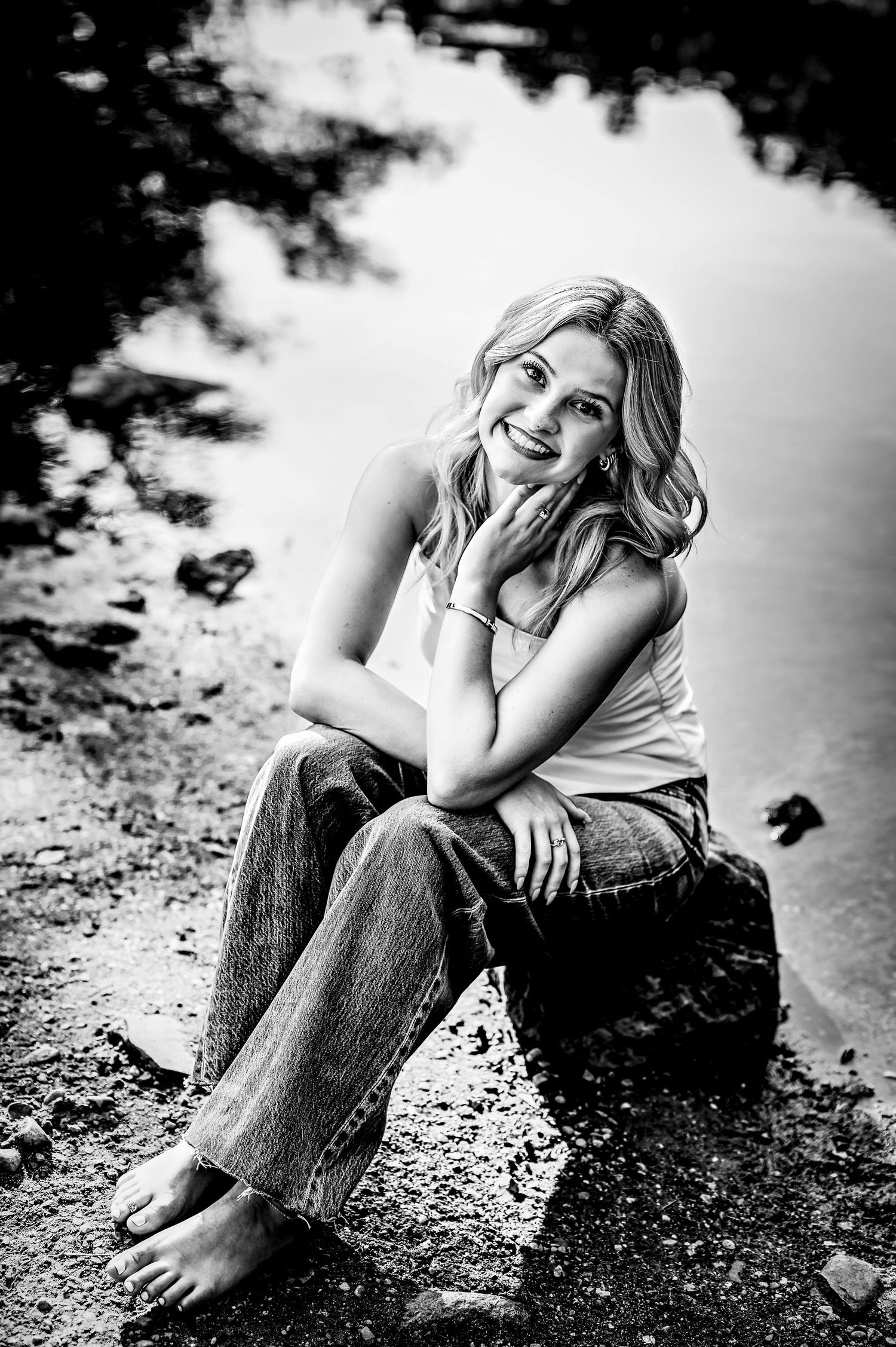 Black and white portrait at the river of a senior girl for senior portraits in Delafield, WI