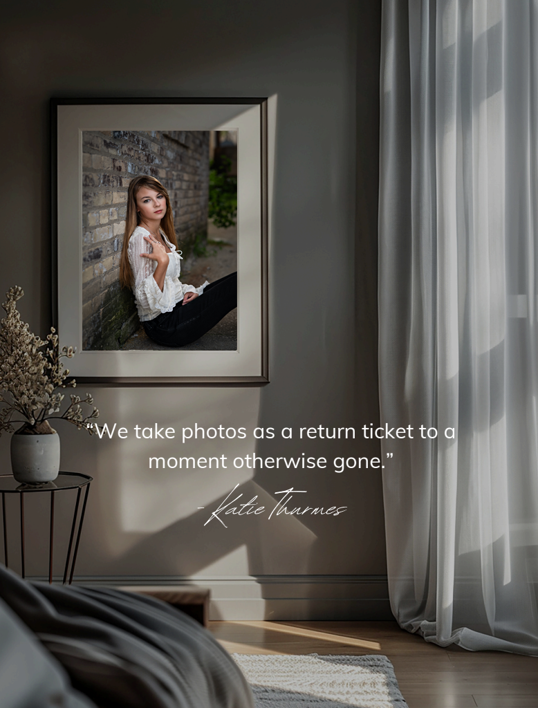 Framed portrait of a young woman displayed in a elegant room with a photography quote by Katie Tharnes.