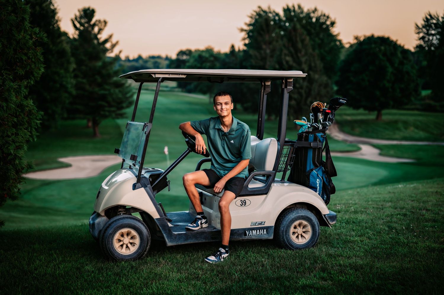 A series of golf cart photos taken at sunset on a scenic golf course with rolling green hills and winding paths at Hon-e-kor Golf Course, WI