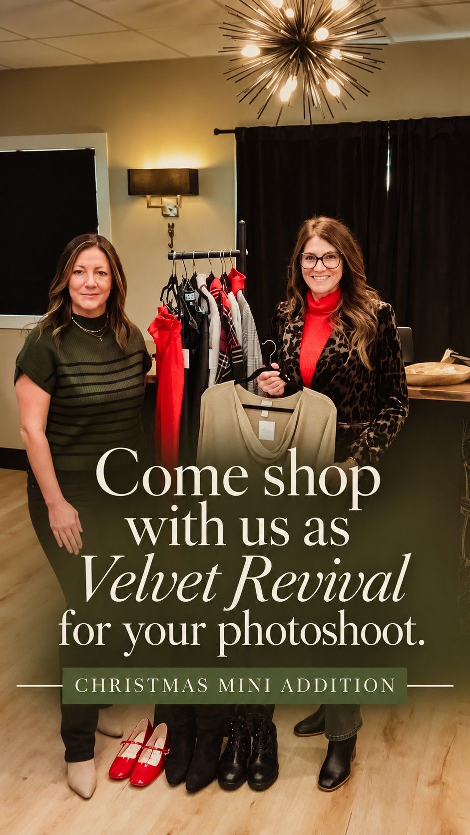 Two women stand beside a clothing rack in a studio for Velvet Revival Christmas mini photoshoot session.