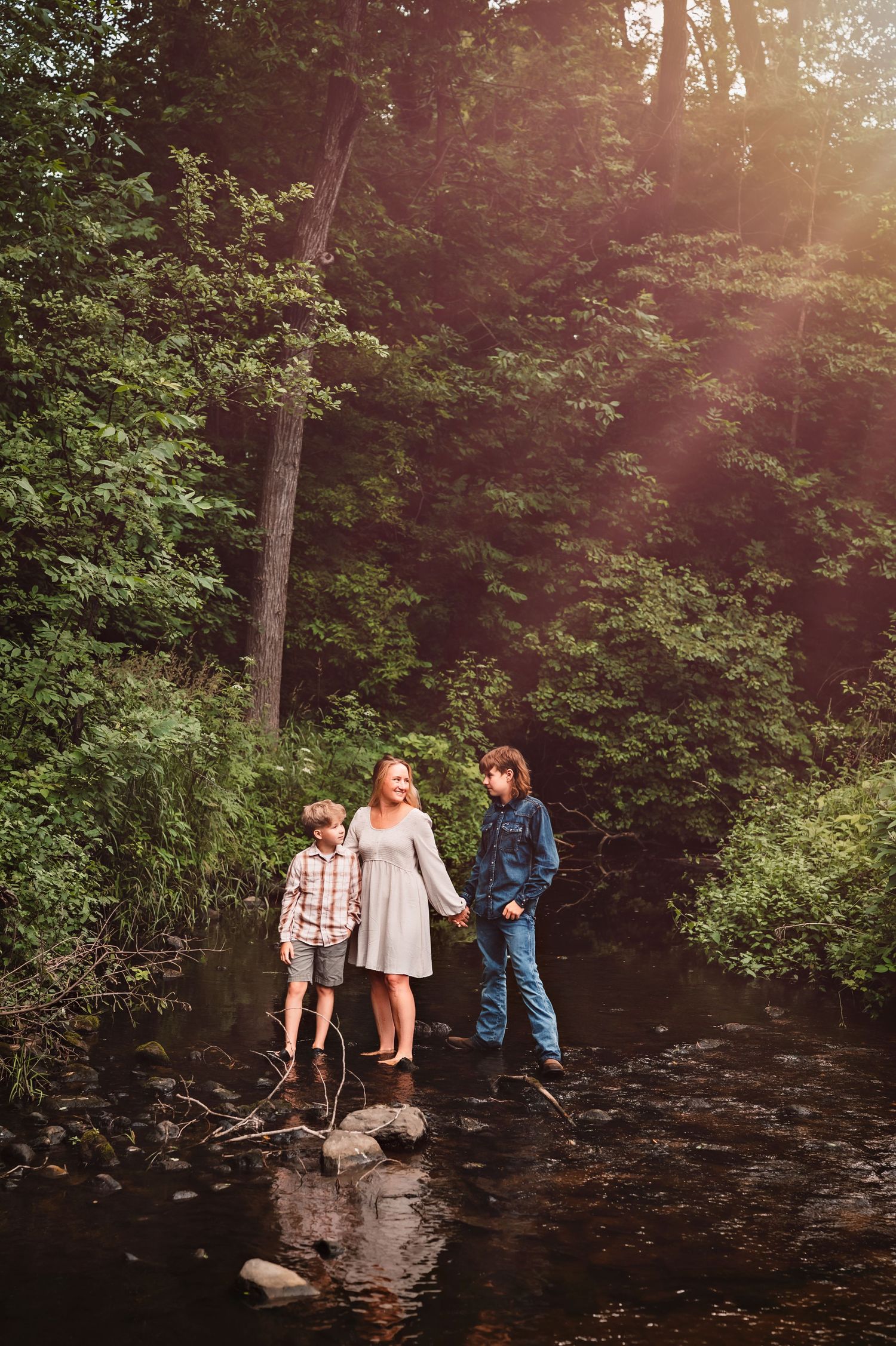 Creek Mini at sunset with mom and her boys for a family session in Kewaskum, WI outdoor Studio.