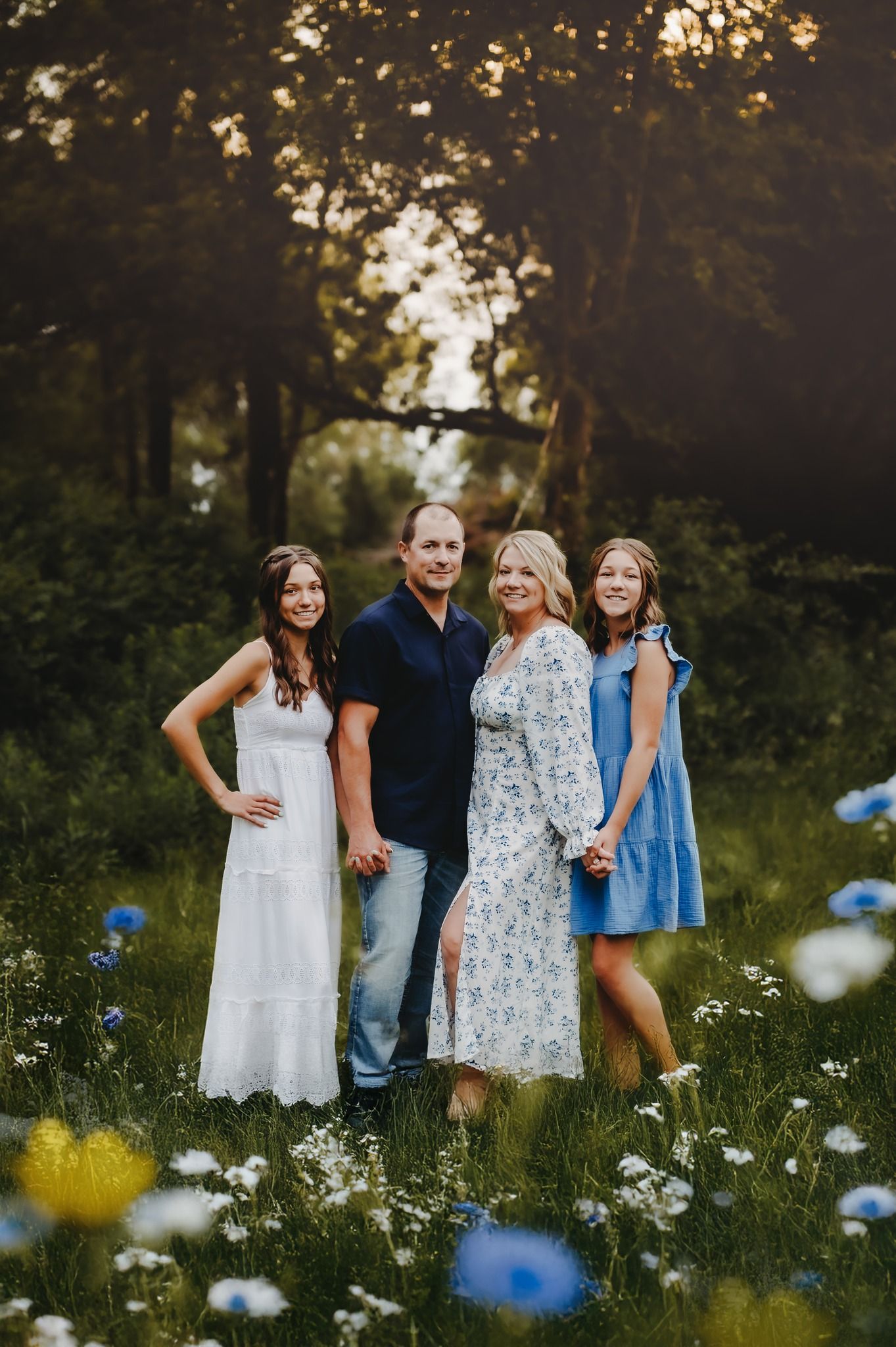Family portrait in a wildflower meadow at sunset mini session near kewaskum, West bend and sheboygan, milwaukee, WI