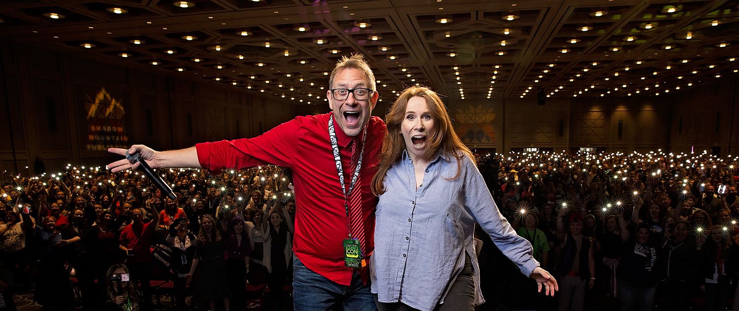Catherine Tate on stage in front of large convention crowd