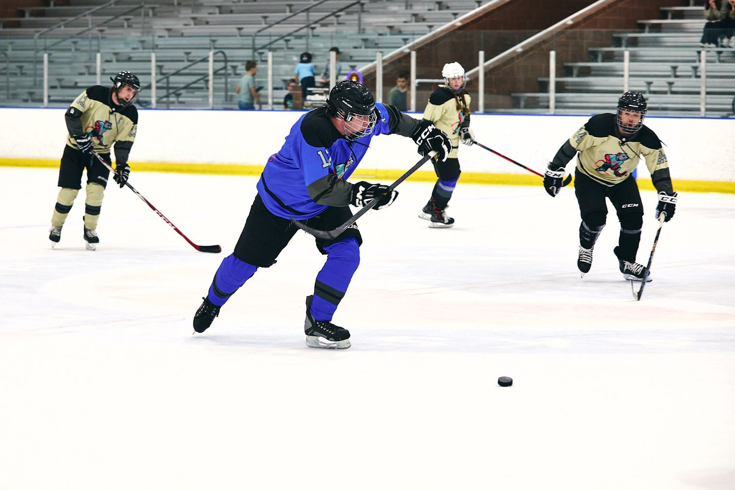 Hockey player racing down the ice on a breakaway