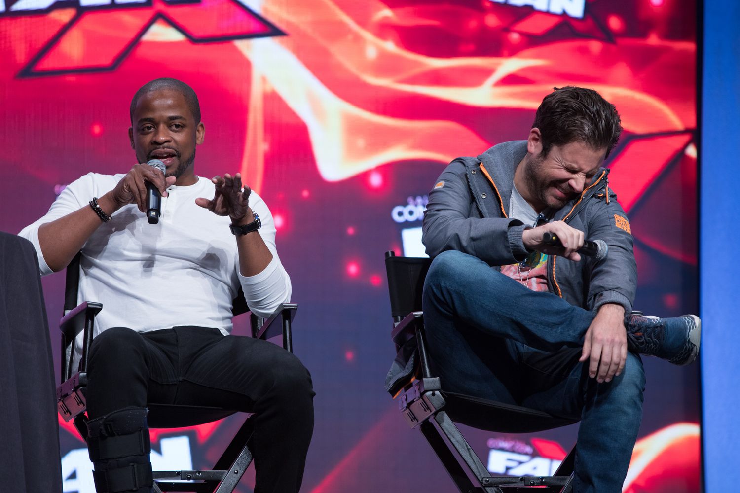 Dulé Hill and James Roday speaking onstage at FanX convention