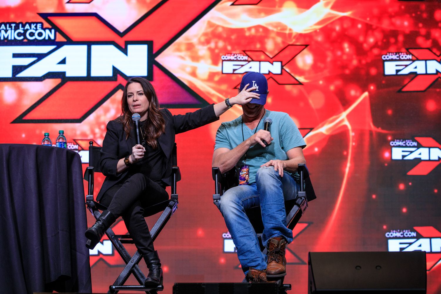 Holly Marie Combs and Brian Krause speaking onstage at FanX convention