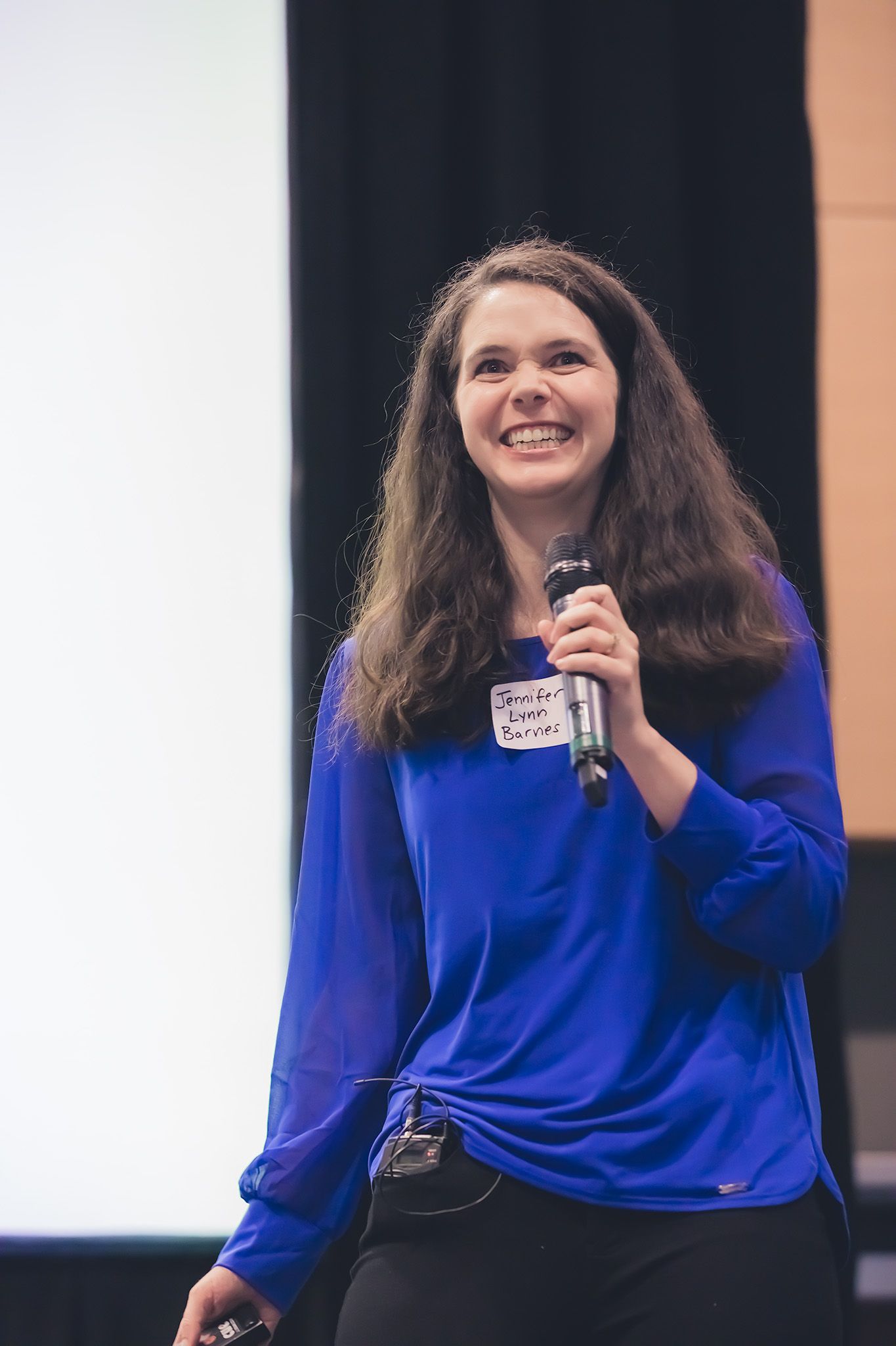 Writer speaking to students during an educational StoryCon event
