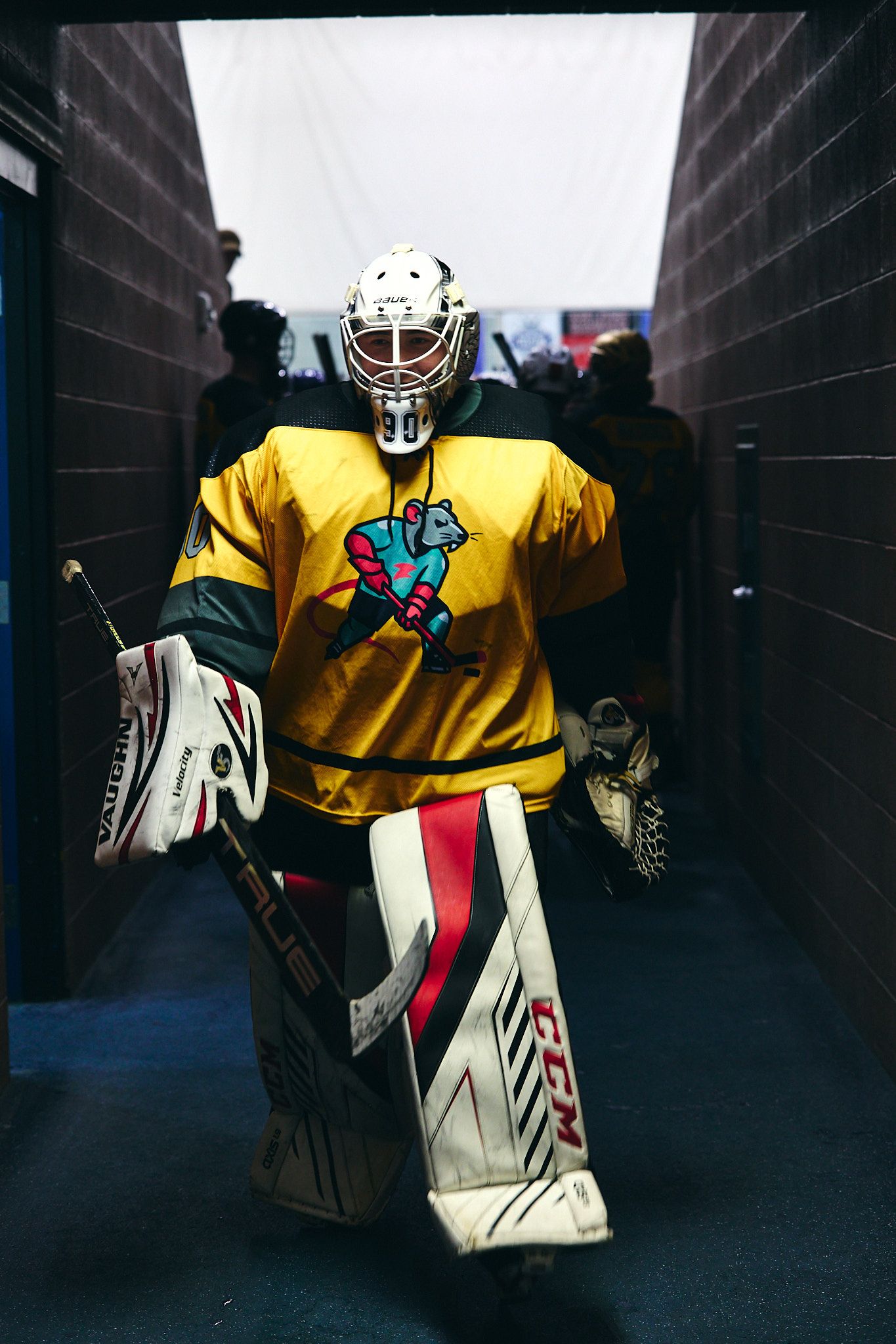 Goalie walking through the tunnel to the ice
