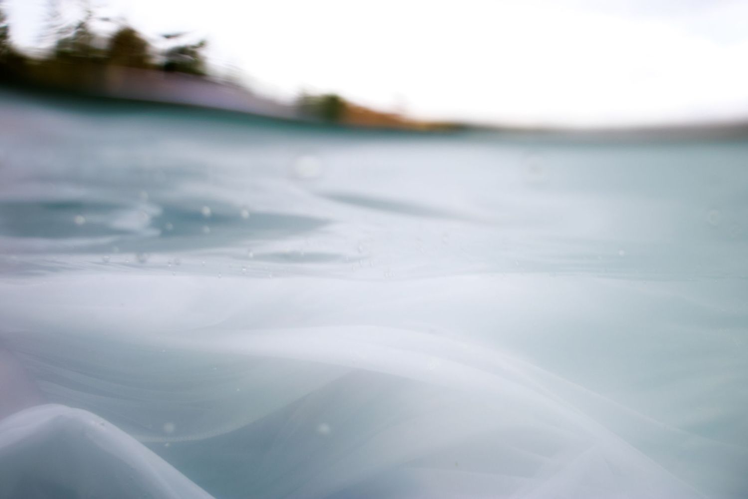 A photo of white tulle in the ocean