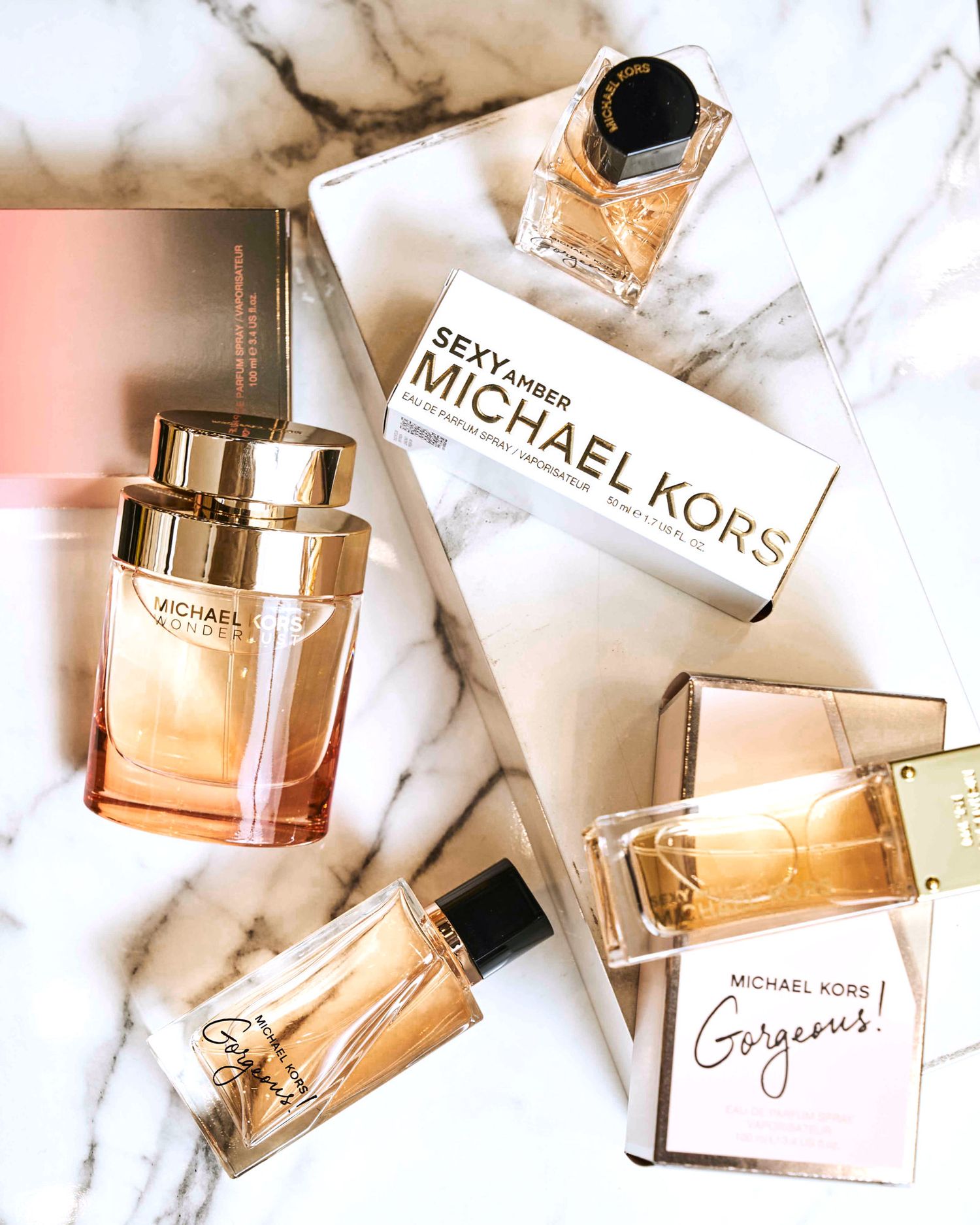 Product photography, luxury perfume commercial flatlay product shoot on marble Sydney by Studio TingTing.