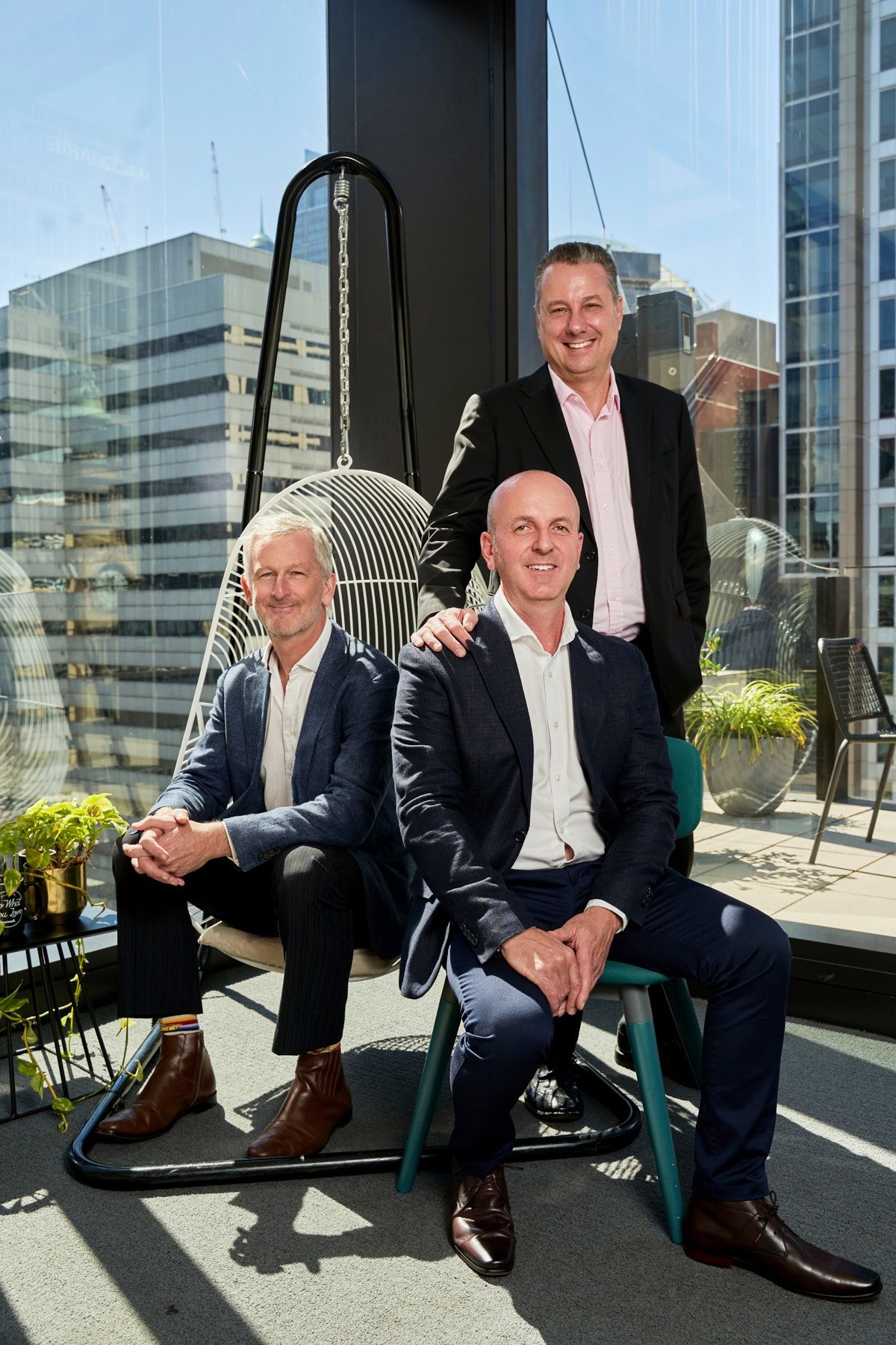 Executive corporate team photography on Sydney CBD rooftop terrace for leadership group by Studio TingTing.