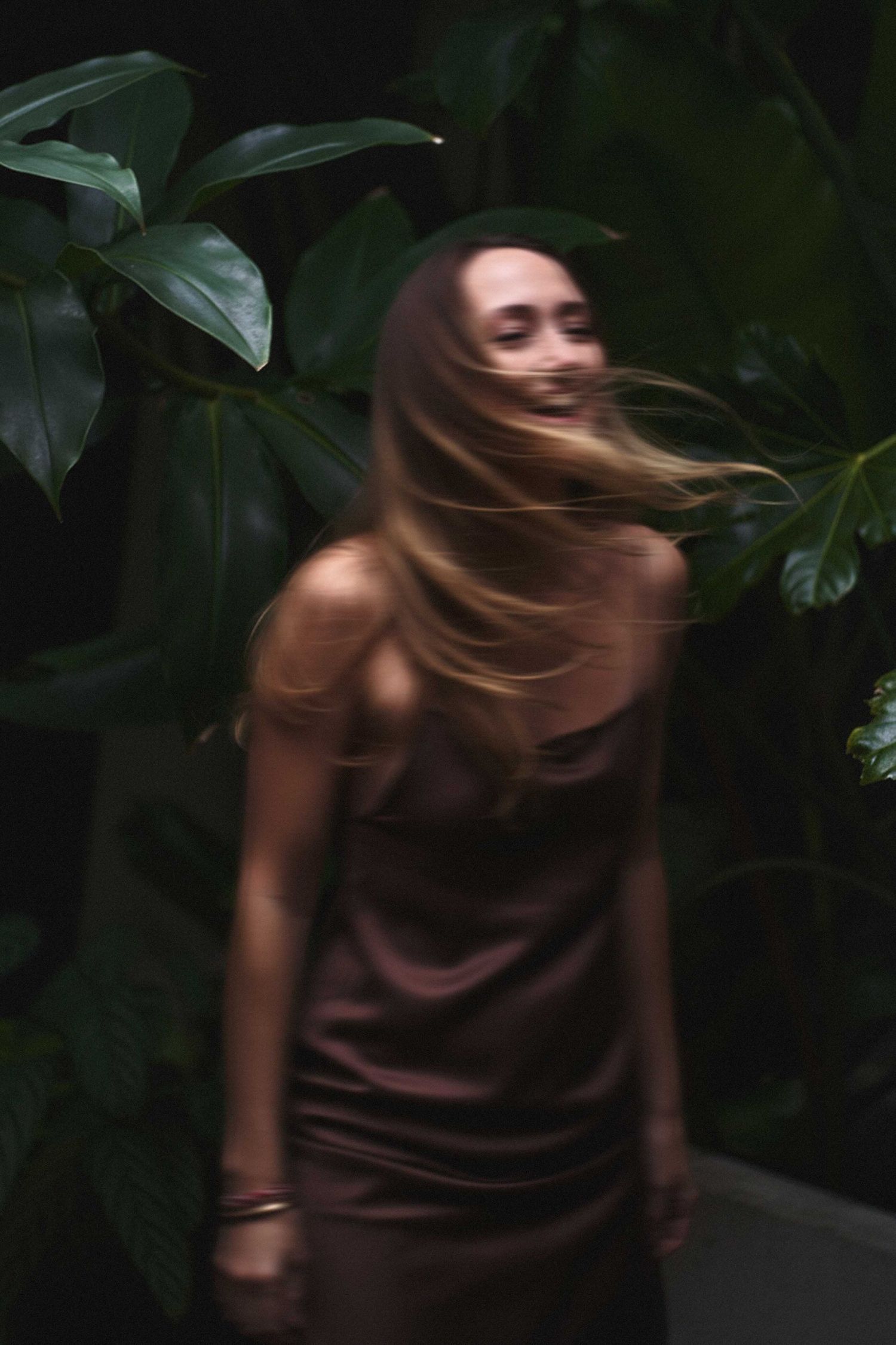 Client laughing during a photoshoot. Shot by Sydney personal branding photographer Tammy TingTing.
