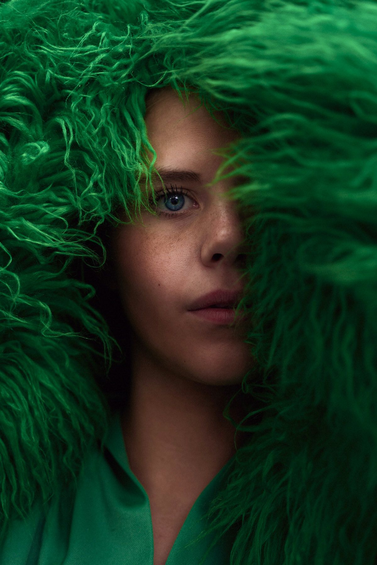 Fashion editorial with vibrant emerald green feathers for a fashion brand in Sydney shot by Sydney fashion photographer Tammy TingTing.