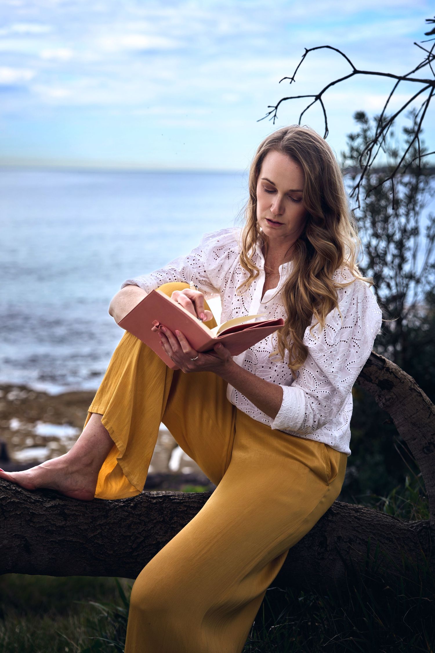 A lifestyle photography series of a female life coach shot in cronulla sydney by Studio TingTing for personal branding photography.