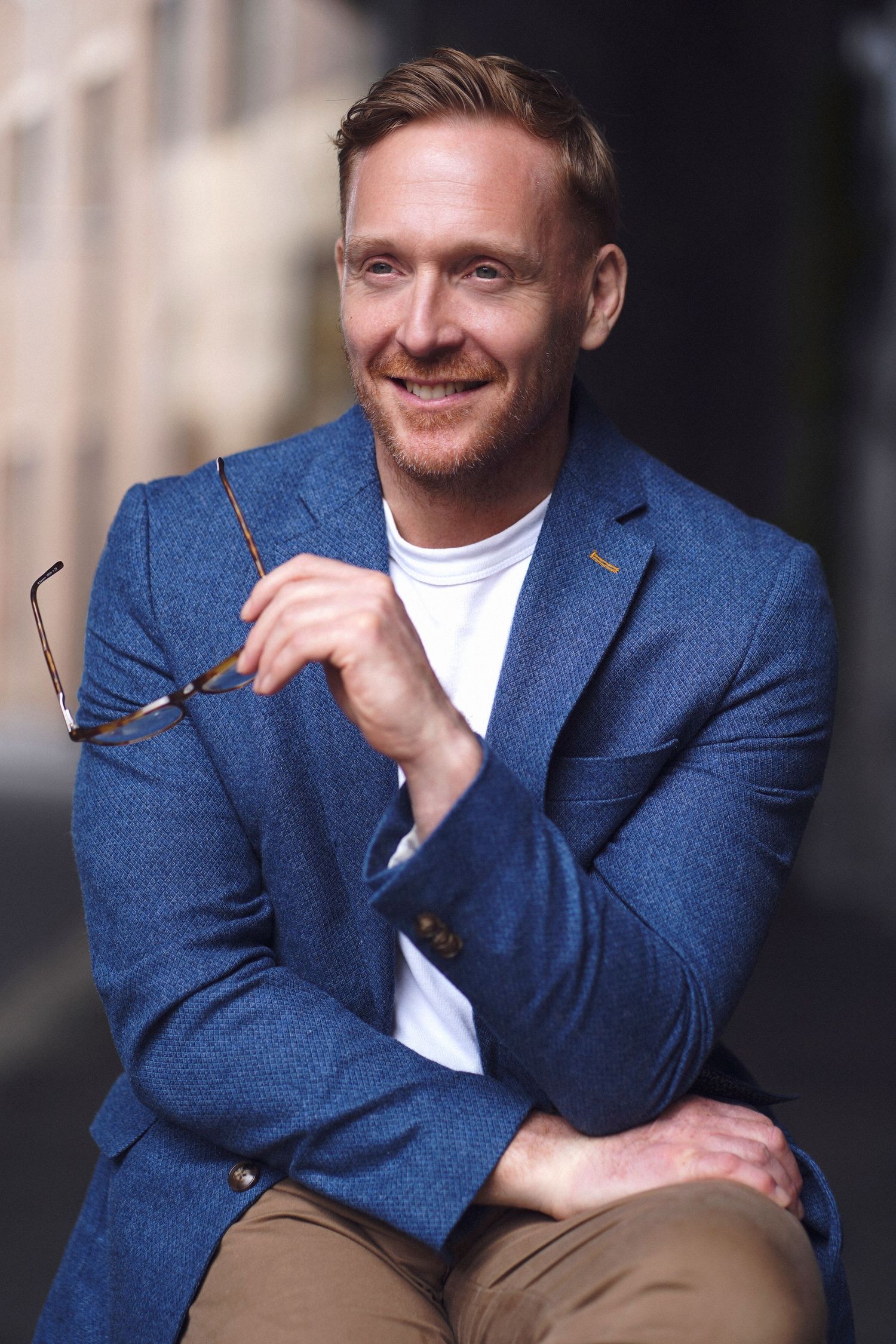 Casual business portrait with bright smile by Studio TingTing in Sydney.