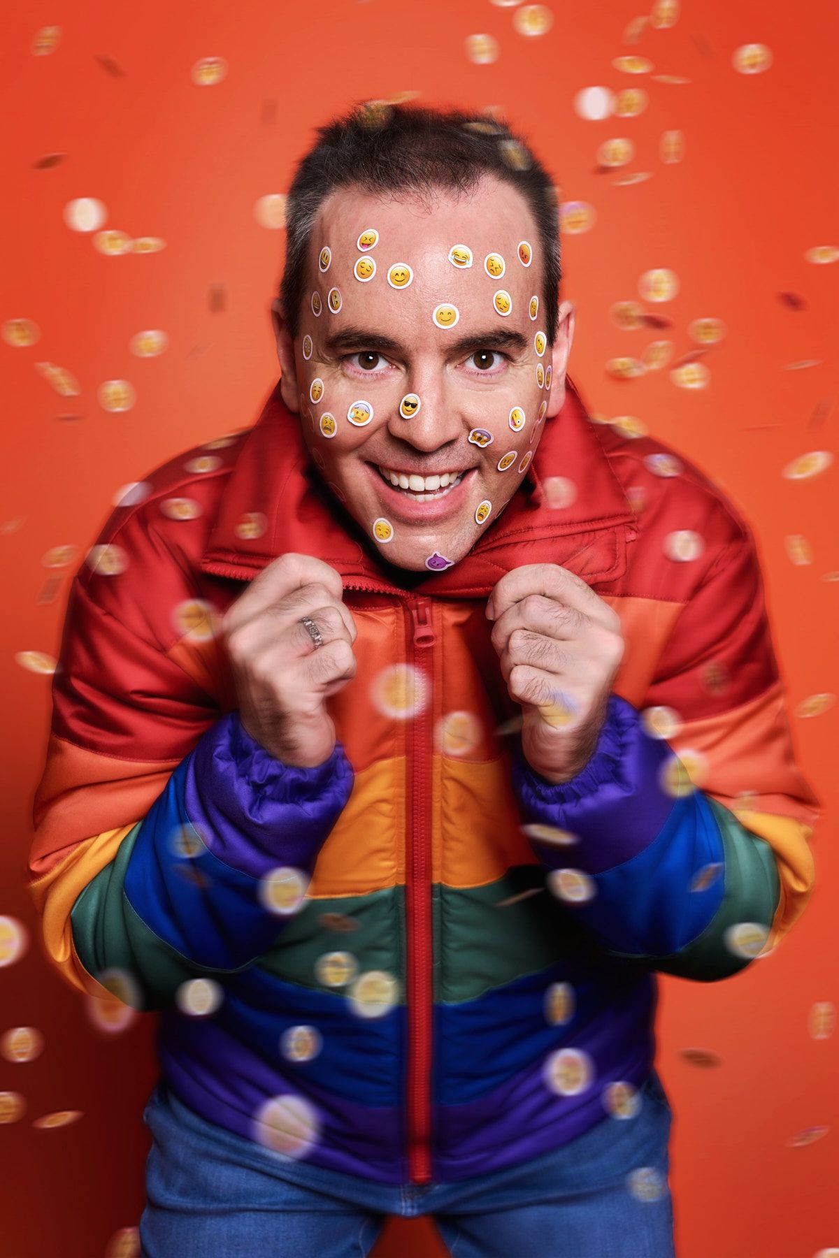 Playful personal branding photo of mental health coach with smiley stickers on face in Sydney by Studio TingTing.