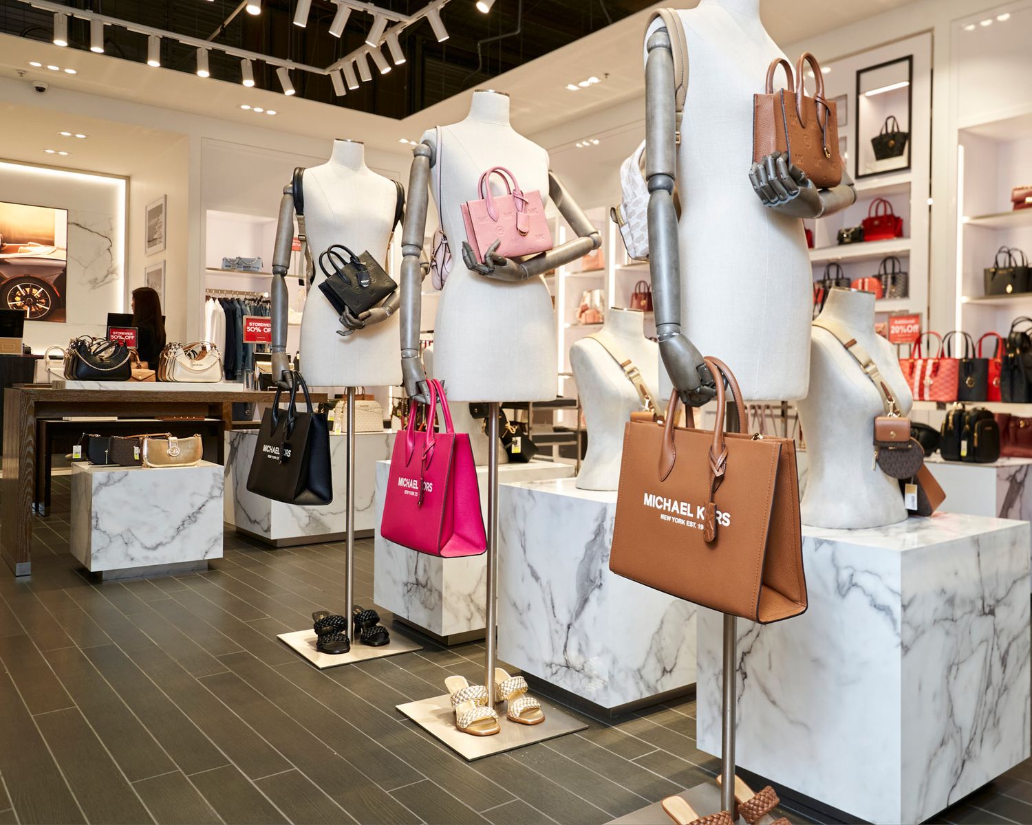 Commercial retail store photography for Michael Kors Sydney Homebush duty free store by Studio TingTing.