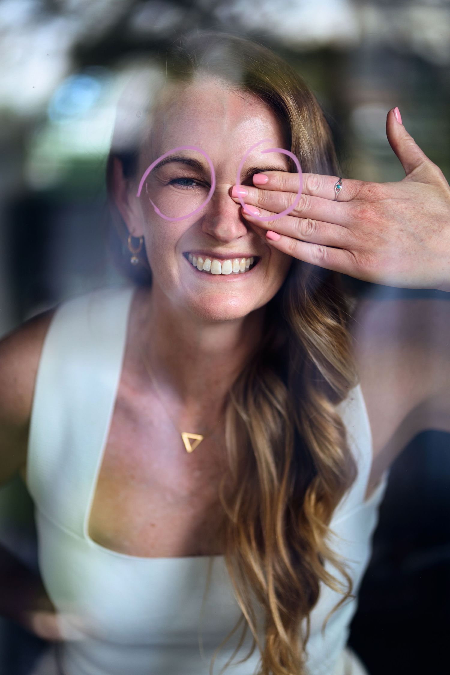 A sequence of photos showing a life coach smile in a bright, candid portrait for website and social media in sydney by Studio TingTing.