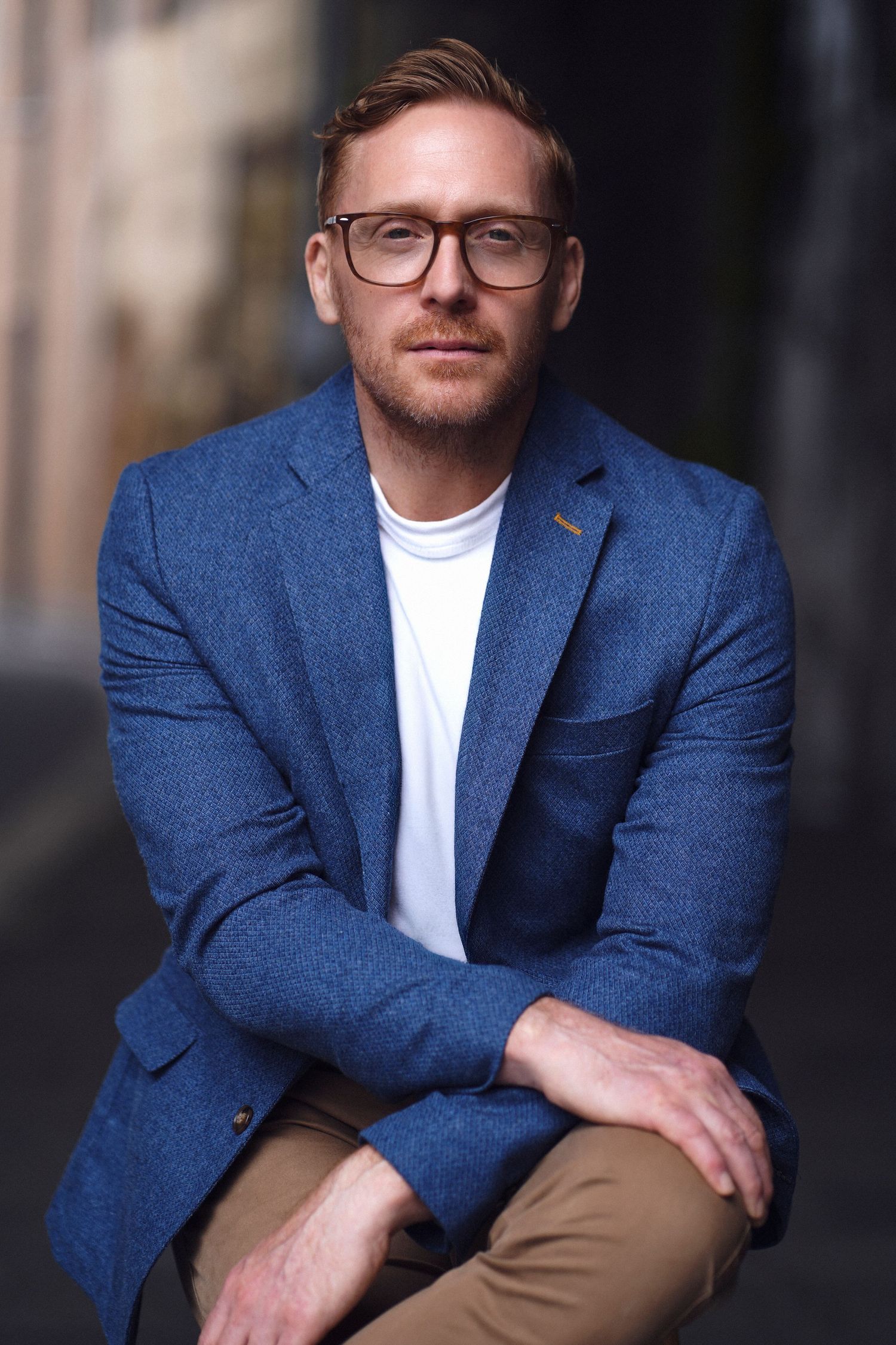 Professional portrait of an entrepreneur in blue blazer shot by Studio TingTing in sydney outdoor session.