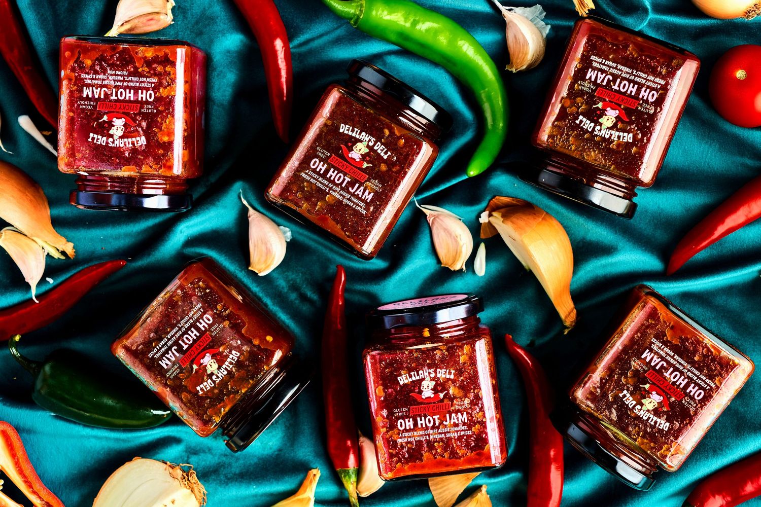 Delilah's Deli hot sauce styled product photography Sydney . Colourful commercial content creation by Studio TingTing.