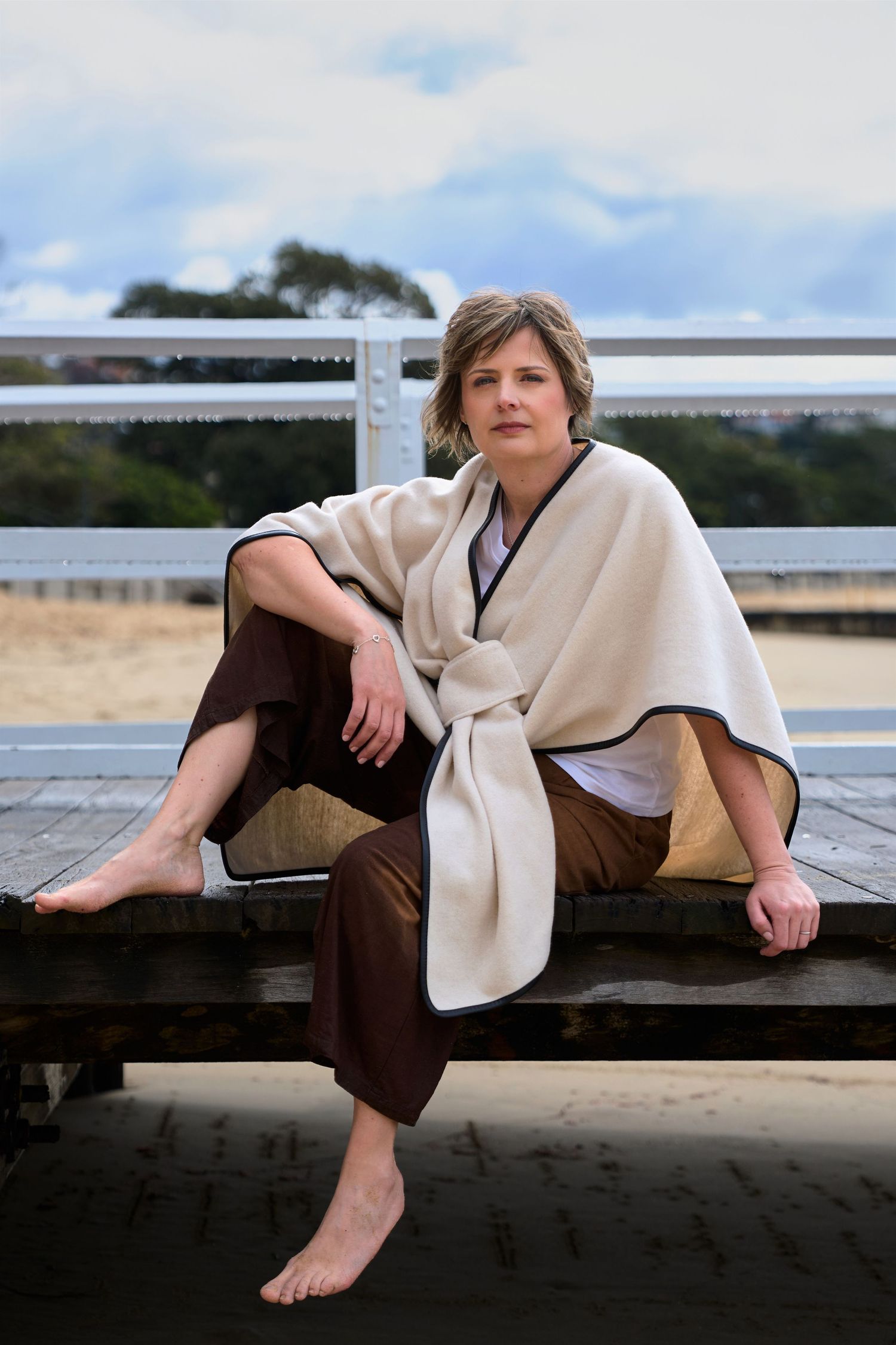 Lifestyle branding photo for a sydney nutritionist in beach setting in sydney by Studio TingTing.
