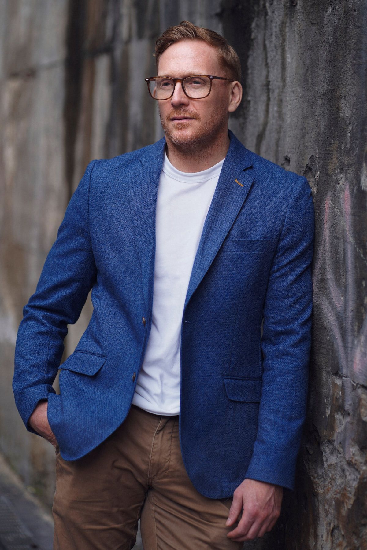 A man posing posing for corporate headshot. Shot by Sydney personal branding photographer Tammy TingTing.