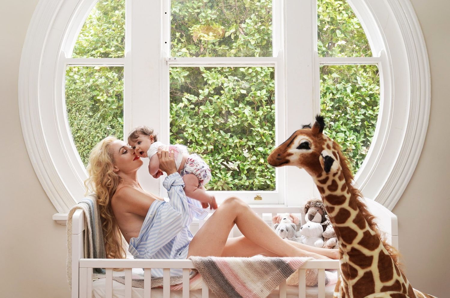 A whimsical nursery scene motherhood photography in Sydney, shot by Studio TingTing.