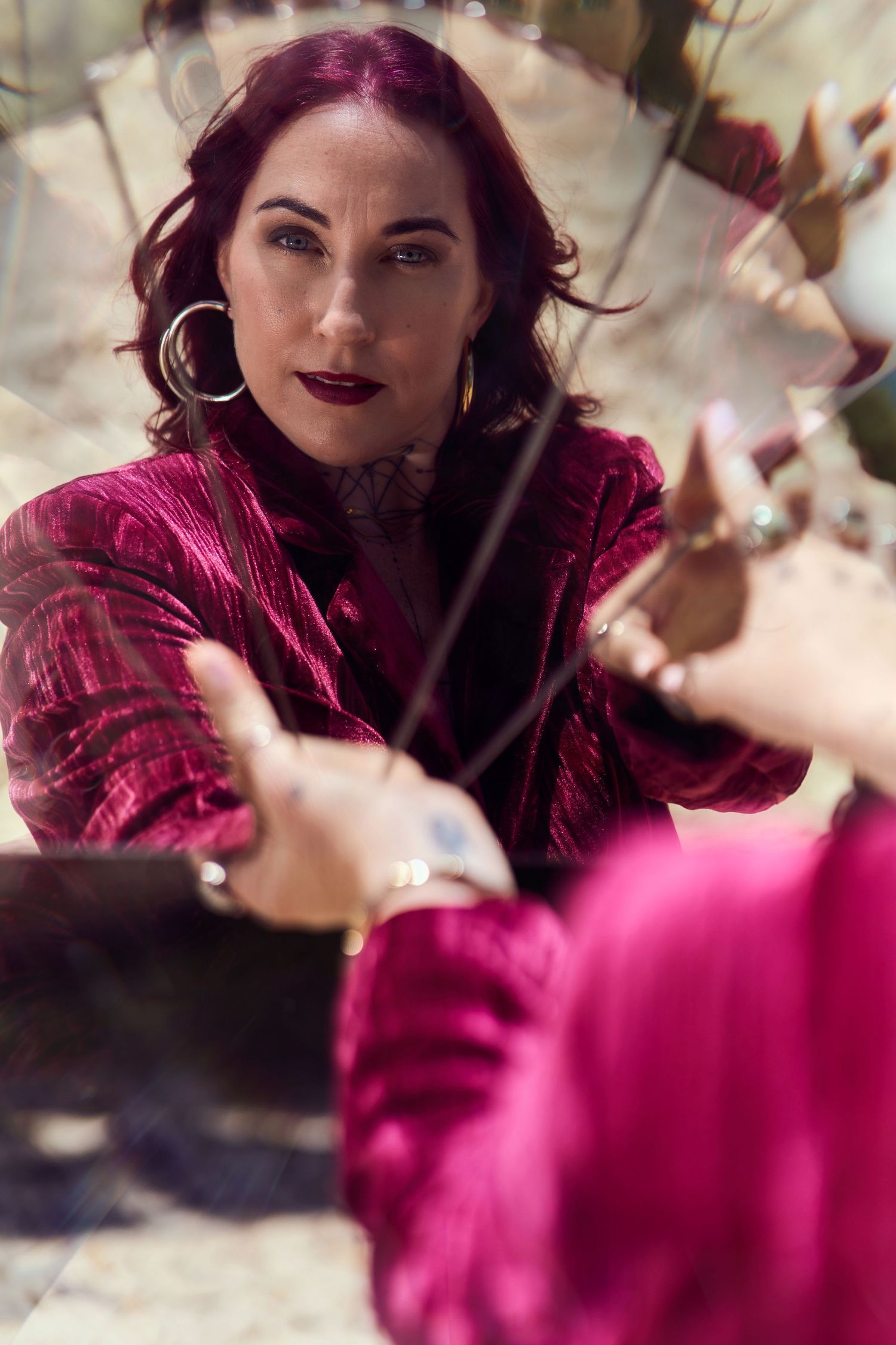 A creative headshot shot through mirror reflection of a business mystic, shot by branding photographer Tammy TingTing in Sydney.